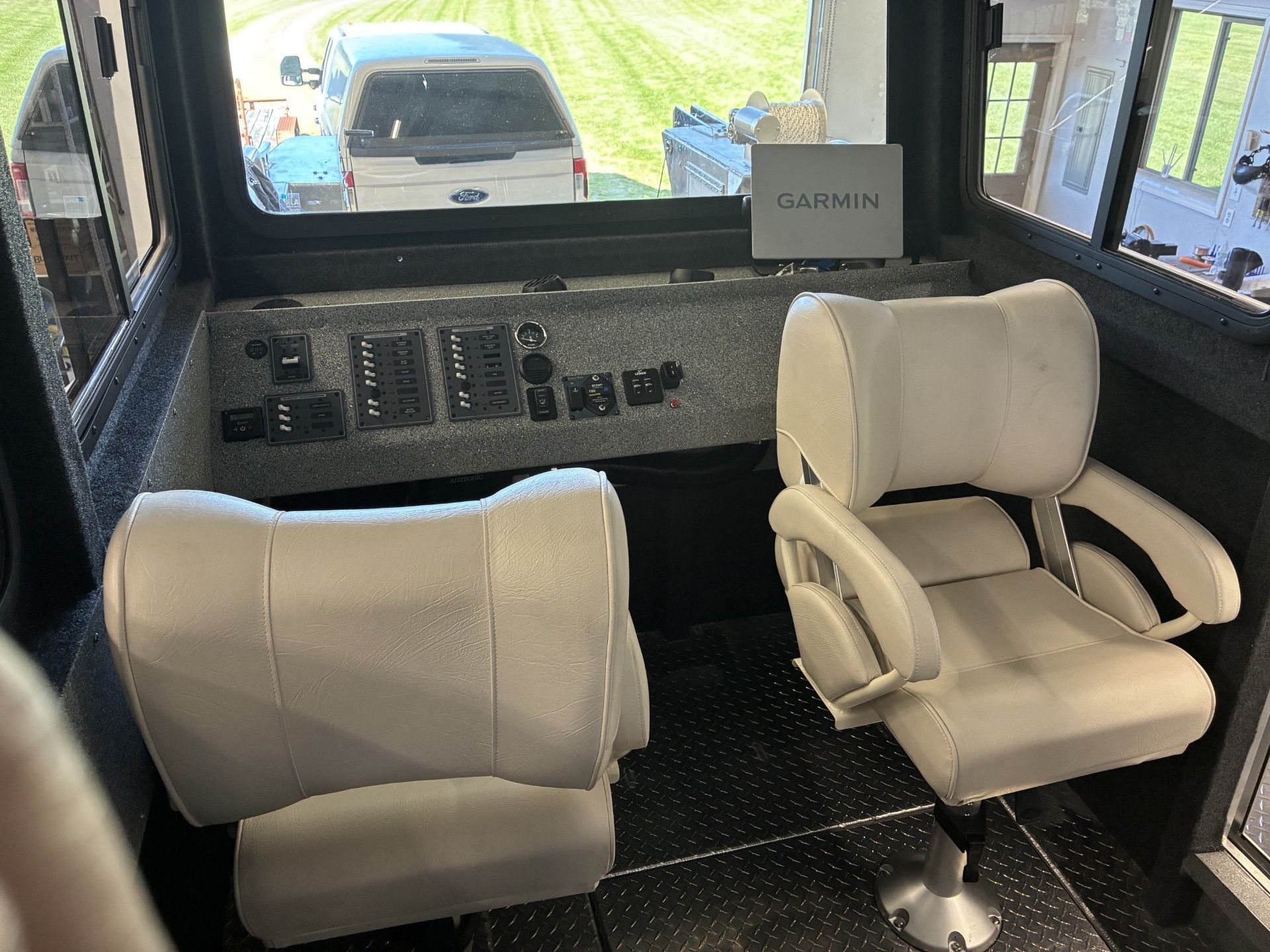 Interior of a 2026 Custom Landing Craft with Garmin navigation.