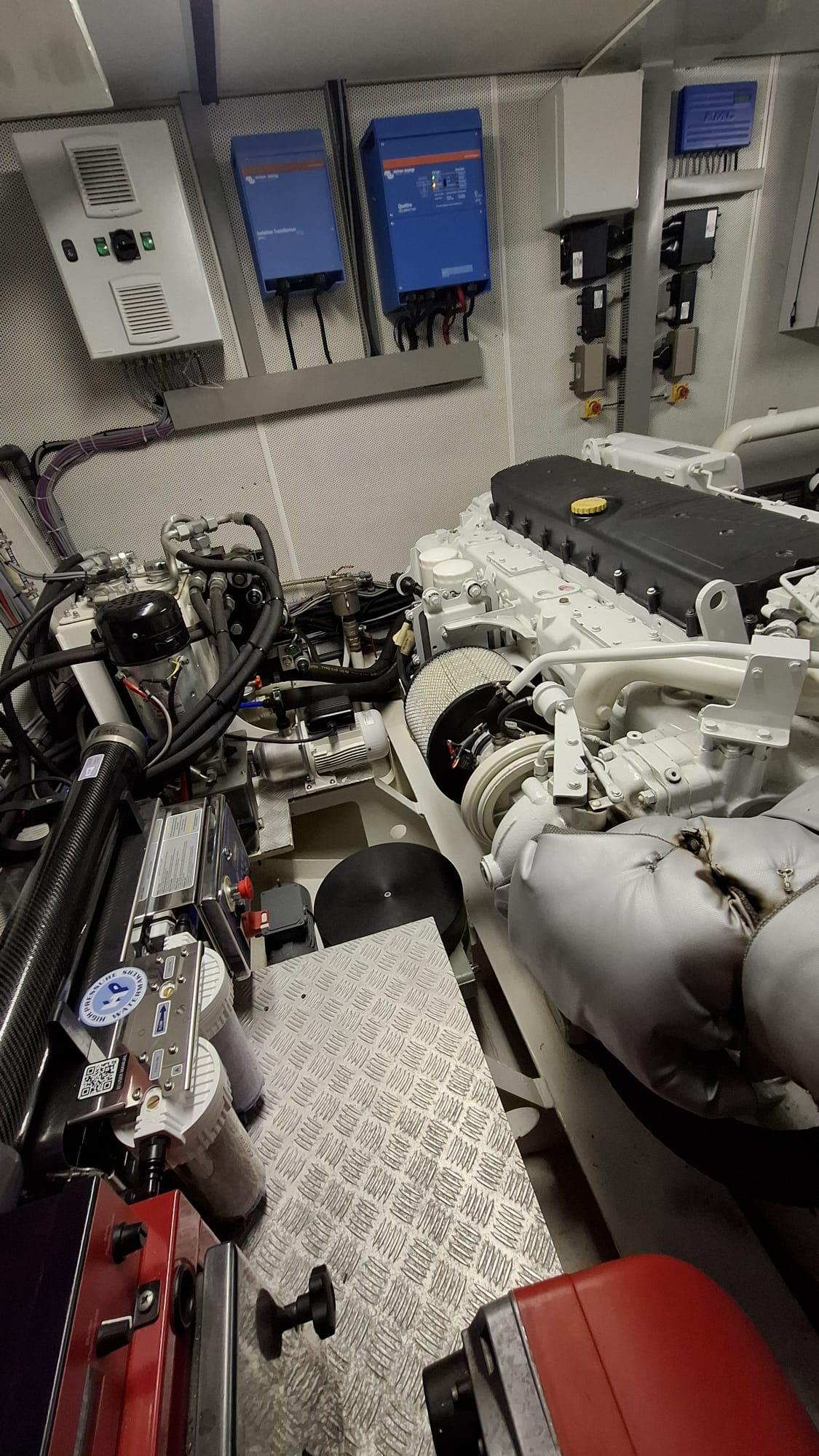 Engine room of 2011 Van der Heijden Superior 2000 yacht, showcasing machinery and control panels.