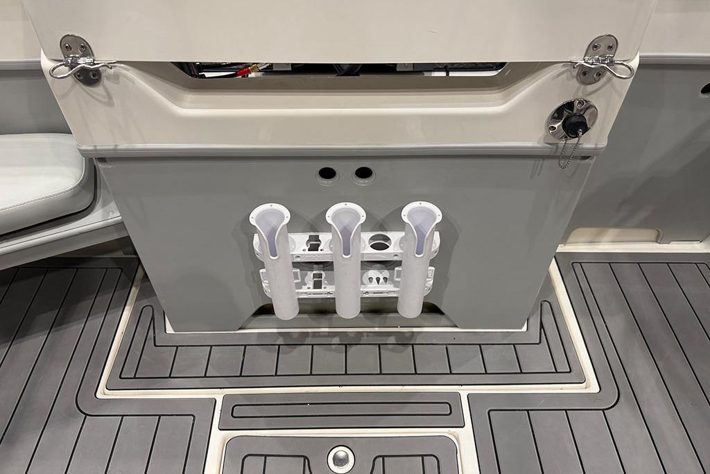 2027 Arima Sea Ranger 21 Hardtop boat interior with rod holders and gray flooring.