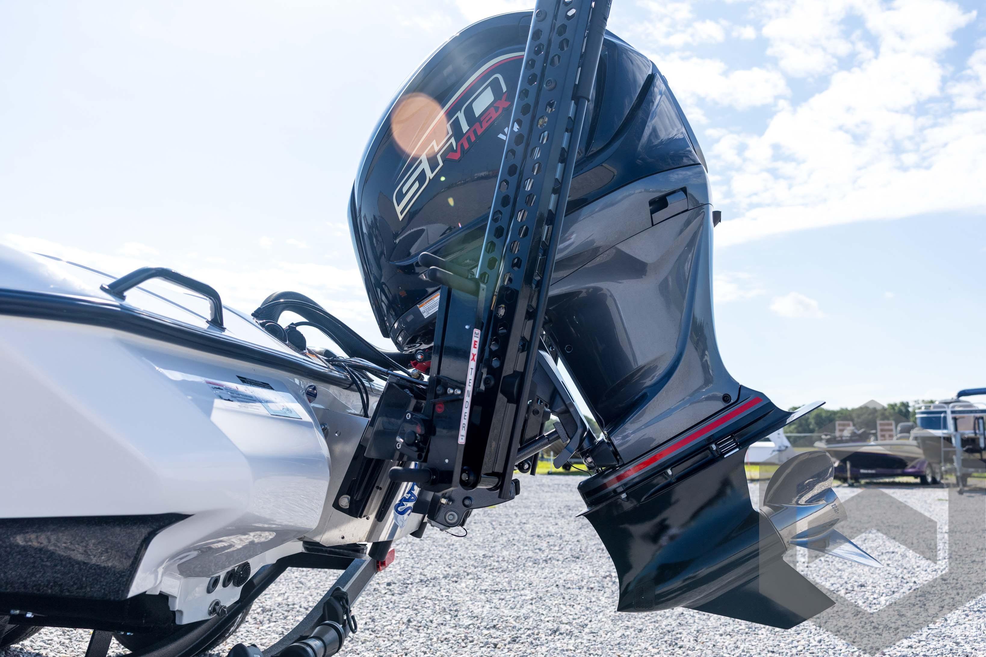2026 Skeeter ZXE21 boat engine, close-up view, outdoors on a sunny day.