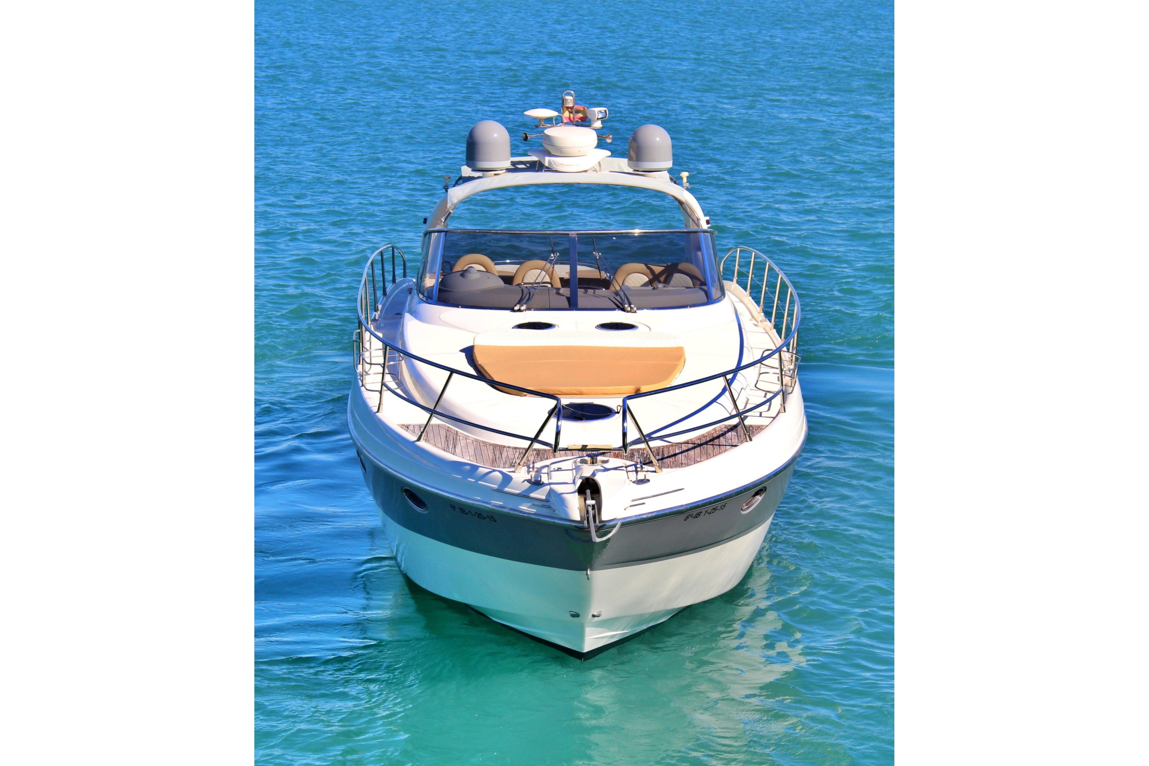 2001 Cranchi Mediterranée 50 yacht on clear blue water, front view.