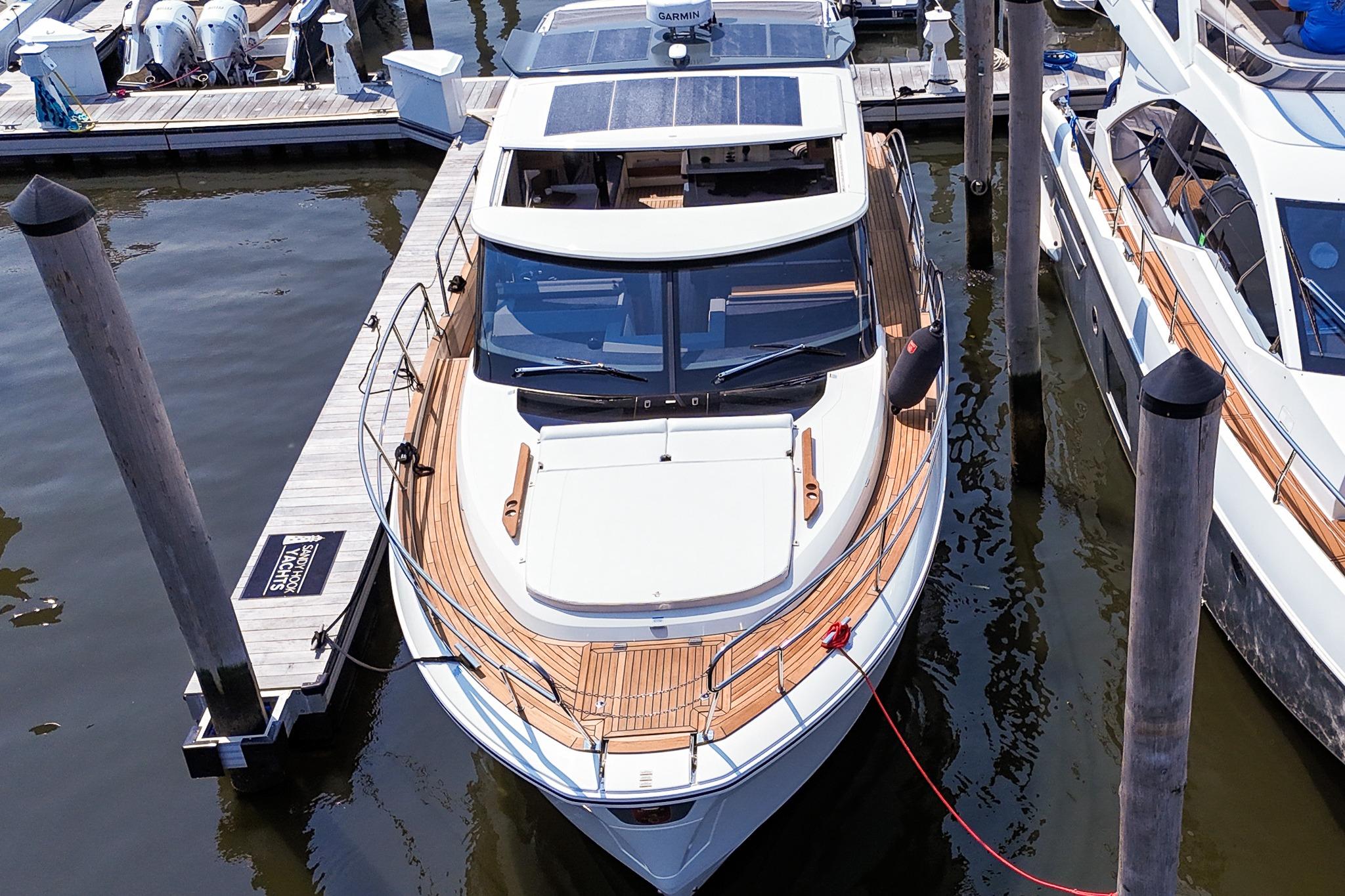 2026 Marex 440 yacht docked at marina, showcasing sleek design and modern features.