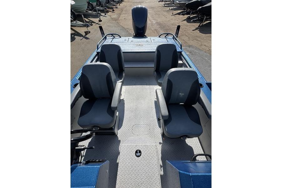 2026 SeaArk Dynasty 2.0 boat interior with four seats and a motor.