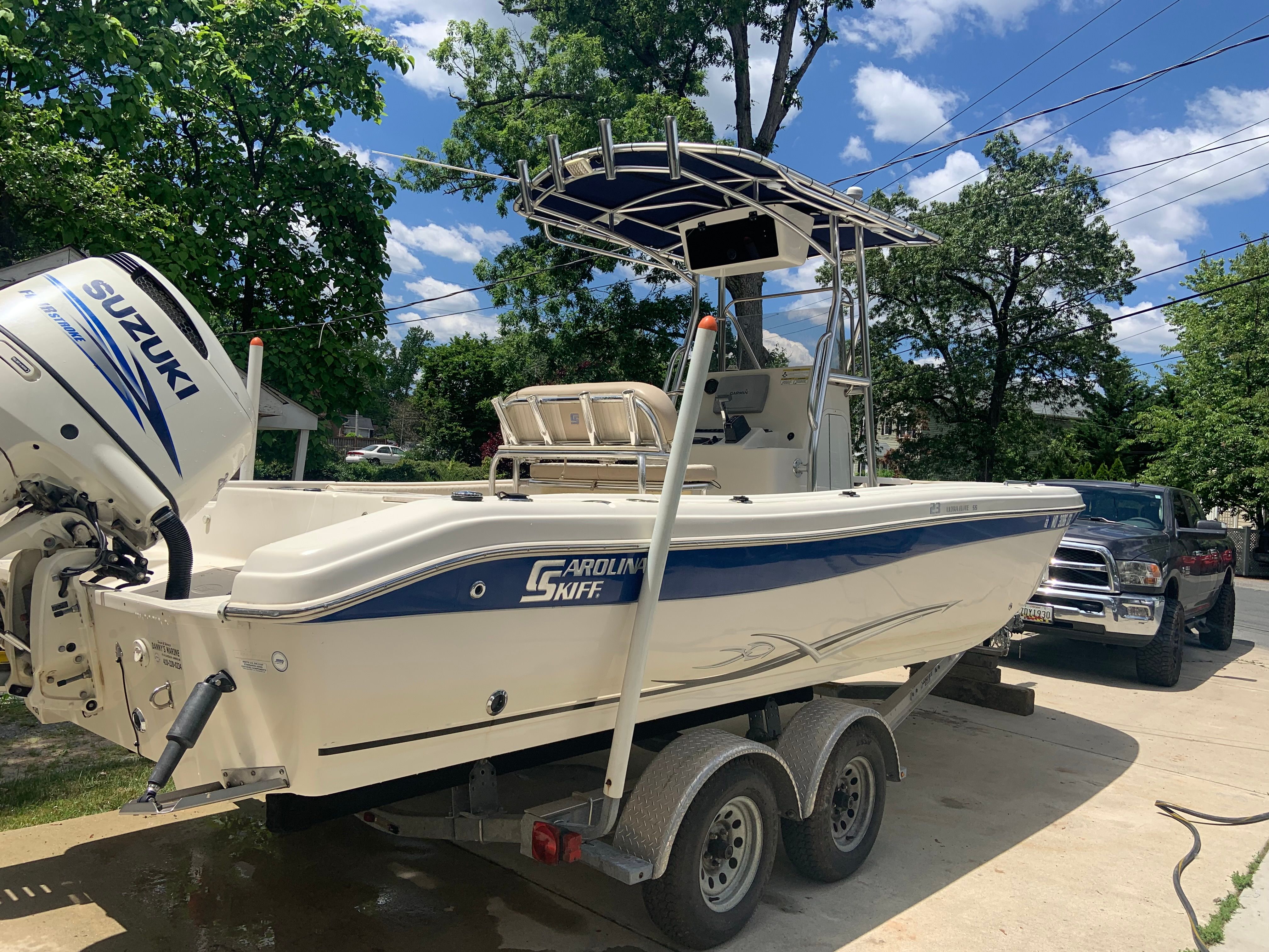 2014 Carolina Skiff 23 Ultra Elite boat on trailer, Suzuki engine.