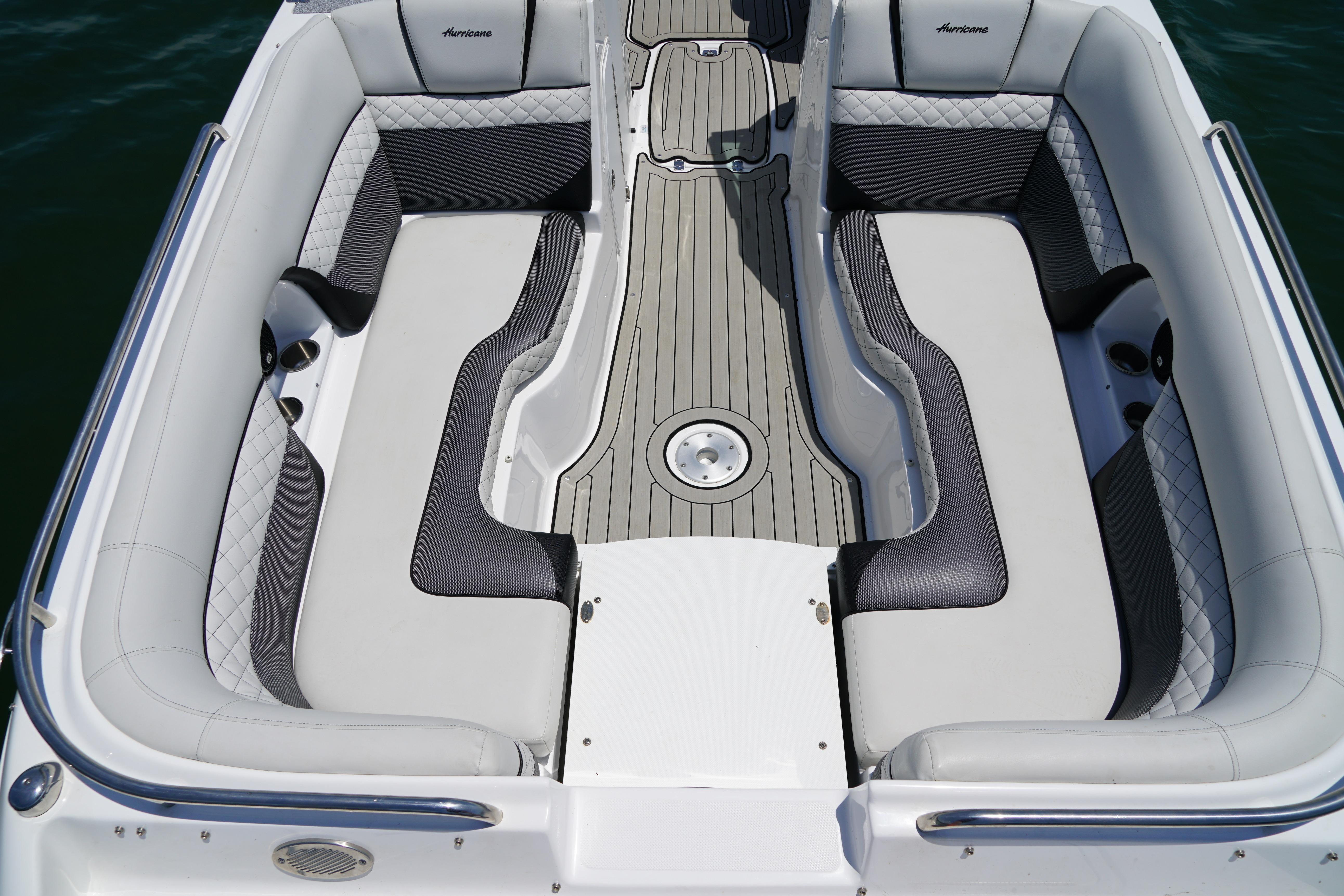 2020 Hurricane SunDeck 2486 OB boat interior with spacious seating and elegant design.