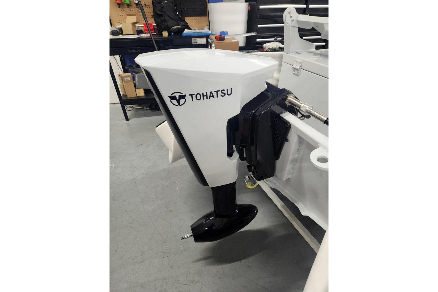 2026 East Marine 320 Electric Tohatsu Alaris outboard motor in workshop setting.