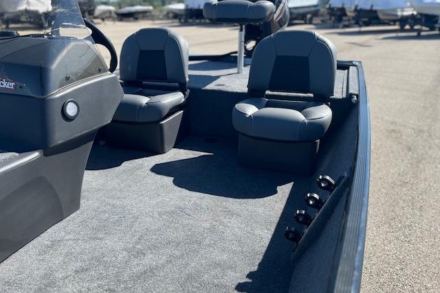 2026 Tracker Bass Tracker Classic XL boat interior with gray seating and carpeted deck.