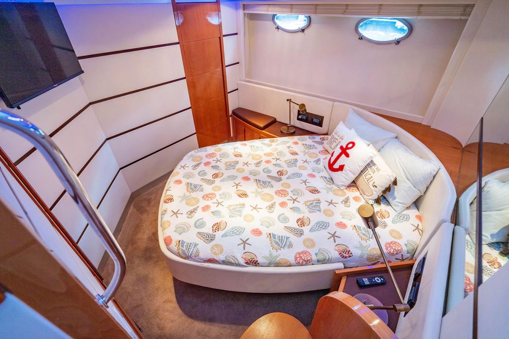 Luxurious cabin on a 2006 Pershing 62 yacht.