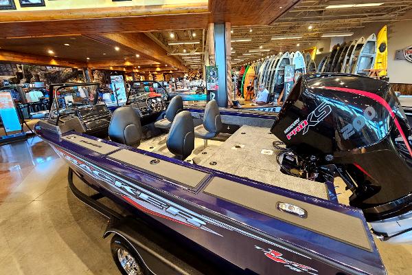 2023 Tracker Targa V-18 WT boat on display in a showroom.
