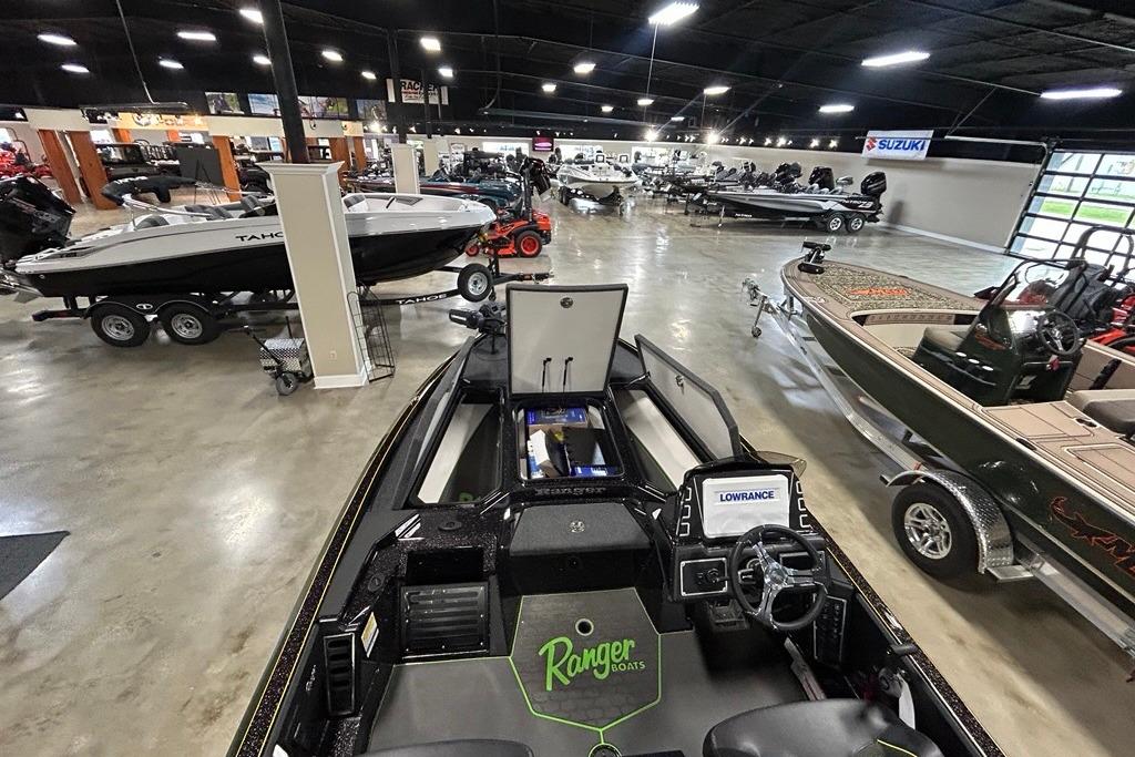 2025 Ranger Z519R Cup-Equipped boat in showroom with various other boats displayed.