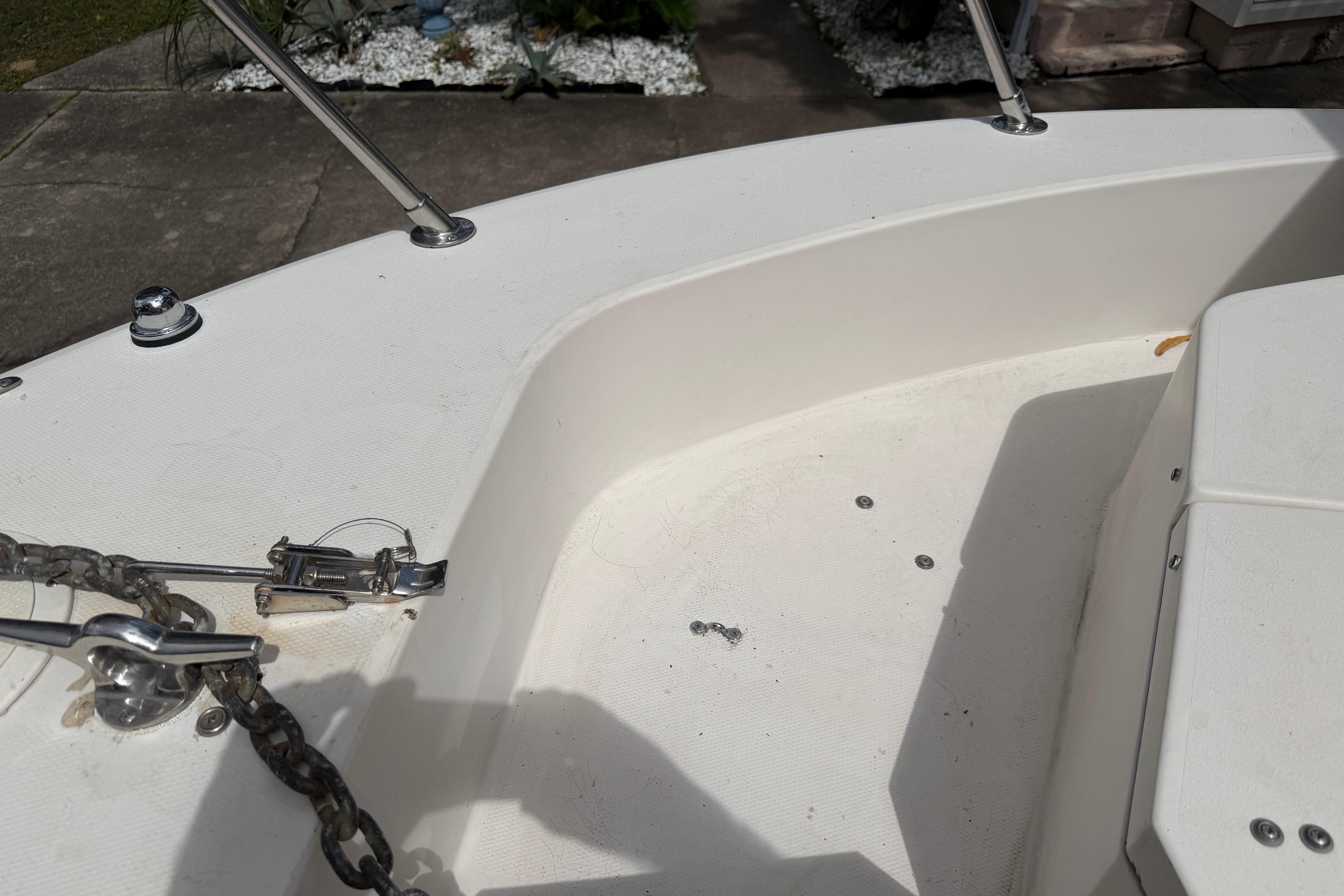 1987 Grady-White Seafarer 226 boat deck with anchor chain and fittings.