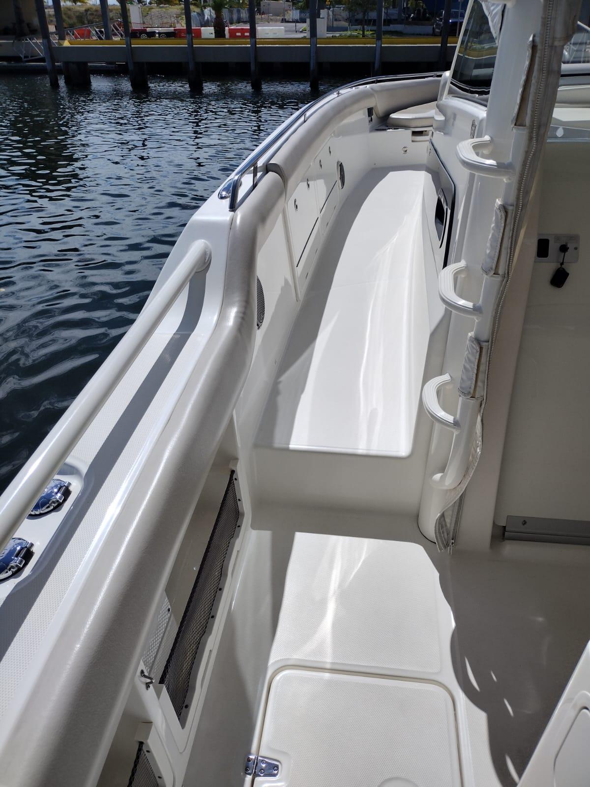 2018 Boston Whaler 420 Outrage boat deck with sleek design and waterfront view.