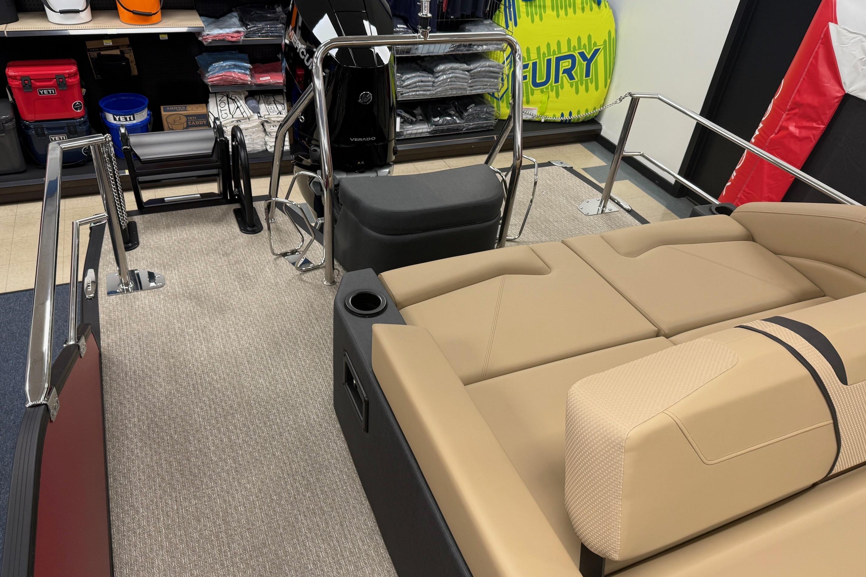 2026 Evotti 725CS boat interior with beige seating and modern design elements.