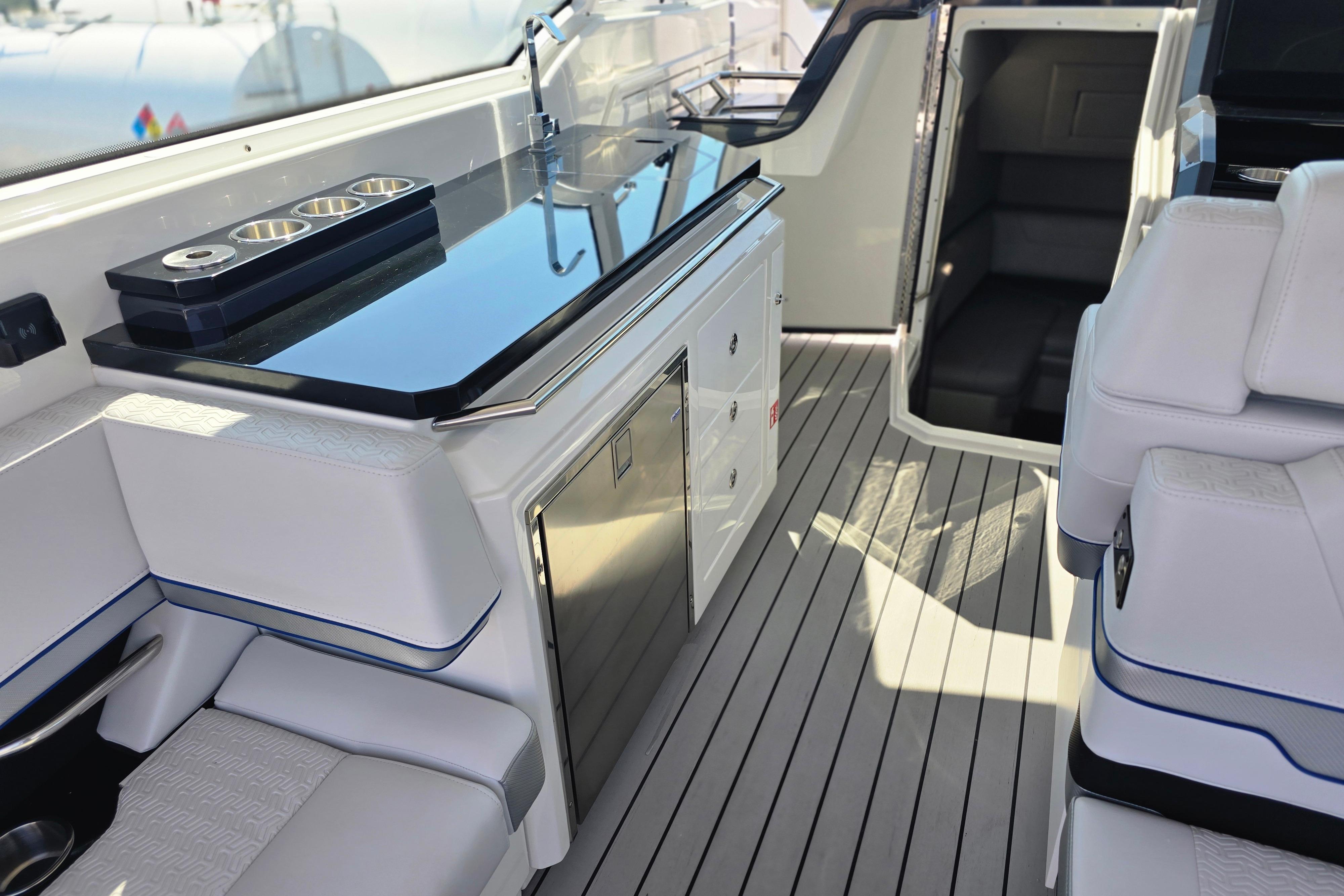 Interior of 2025 Formula 380 Super Sport Crossover OB, featuring sleek seating and modern amenities.