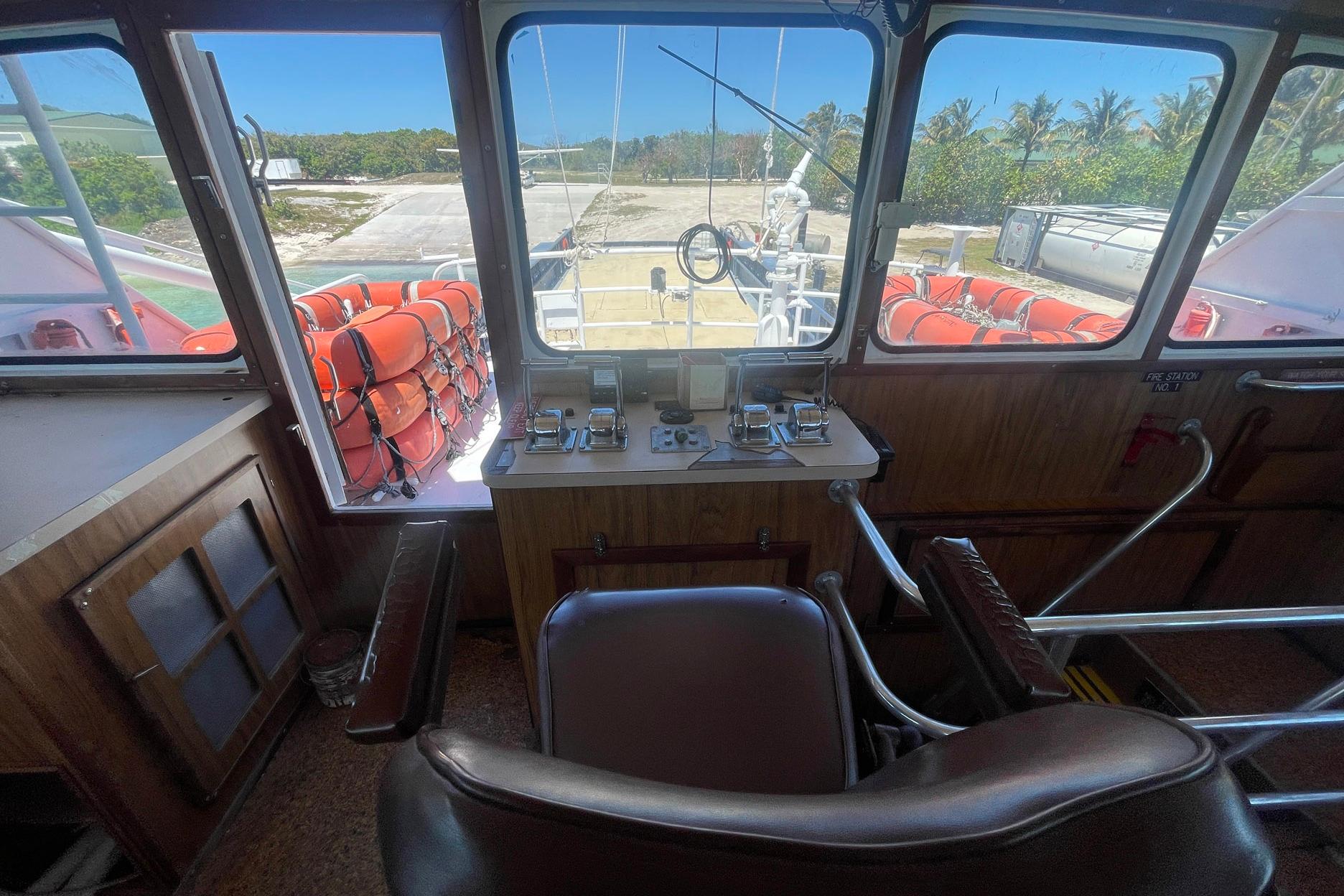 Interior view of a 1993 Breaux Brothers Crew Boat cockpit with control panel.