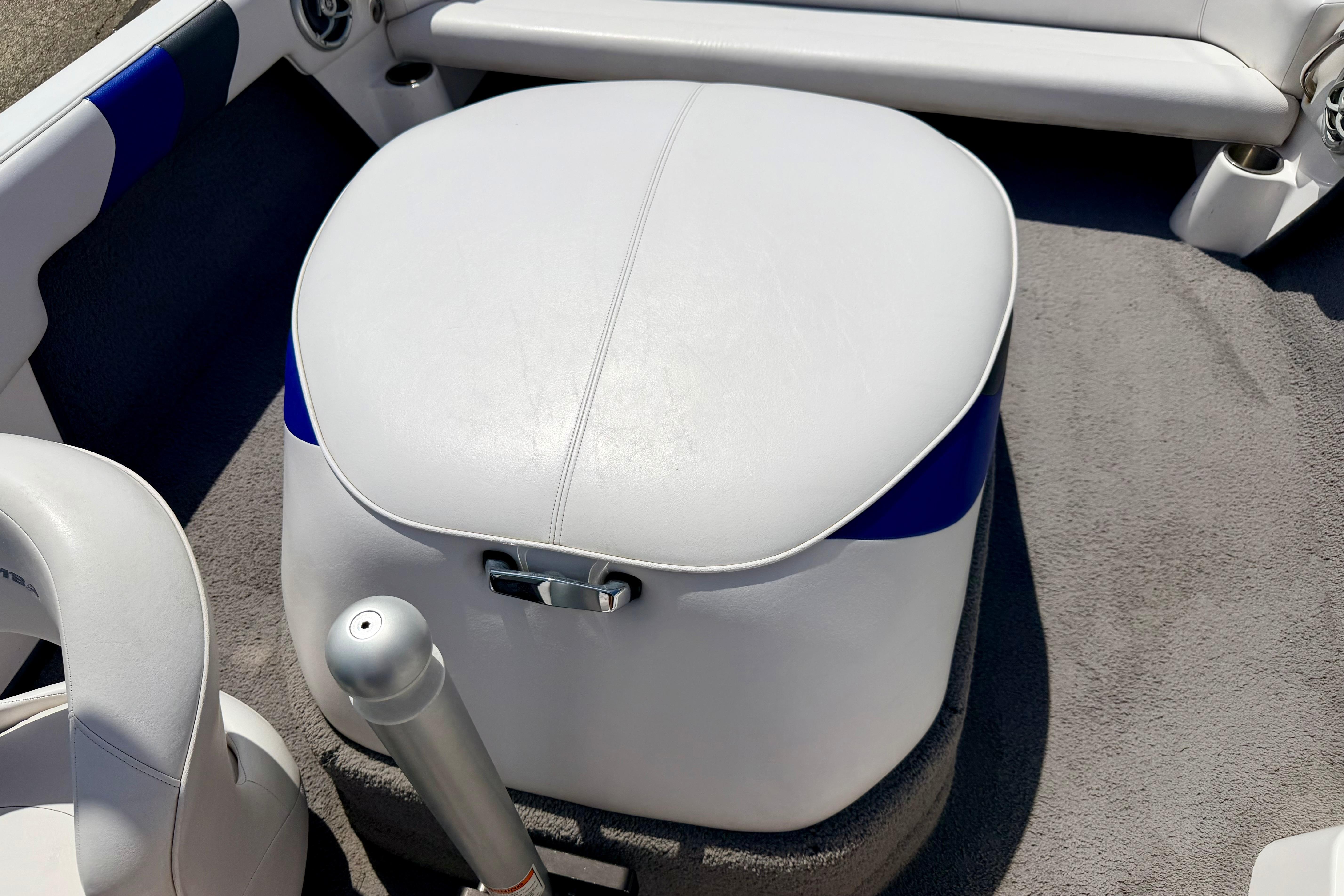 2008 Moomba Outback V boat interior with white and blue seating.
