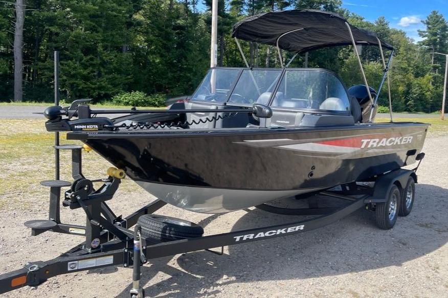 2026 Tracker Targa V-18 WT boat on trailer, parked outdoors.