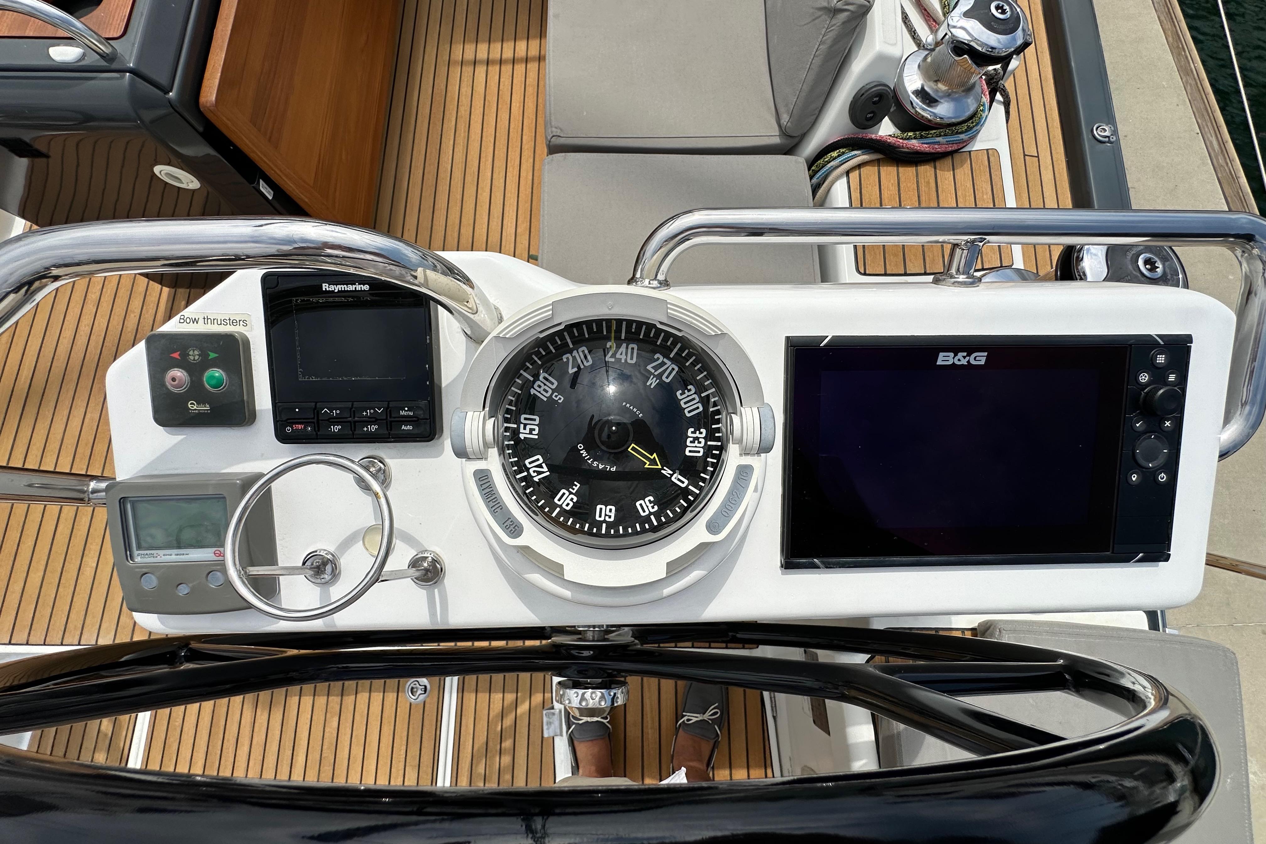 Cockpit of 2018 Jeanneau 54 yacht with navigation instruments and compass.