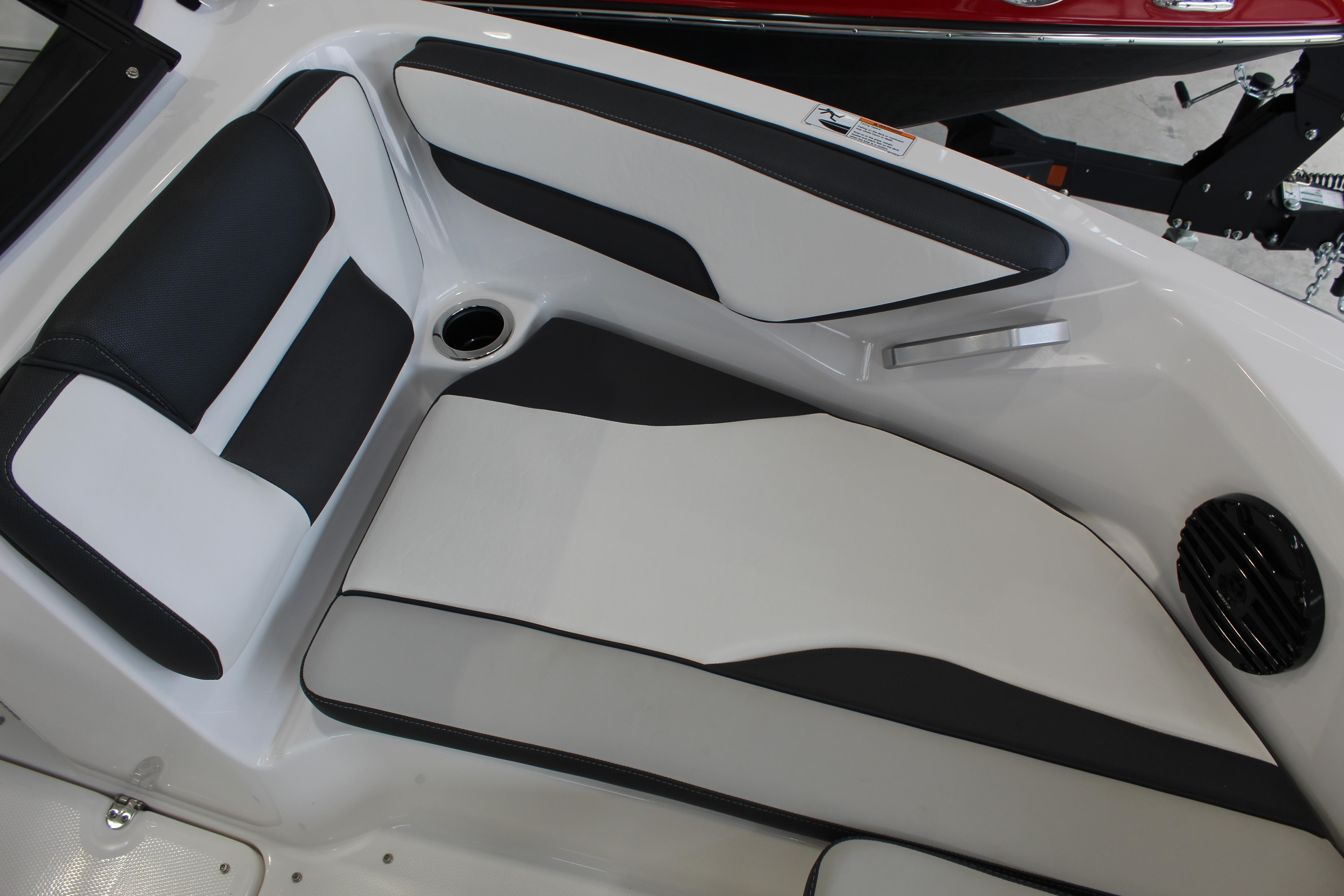 Interior seating of 2026 Yamaha Boats 195S, featuring sleek black and white upholstery.