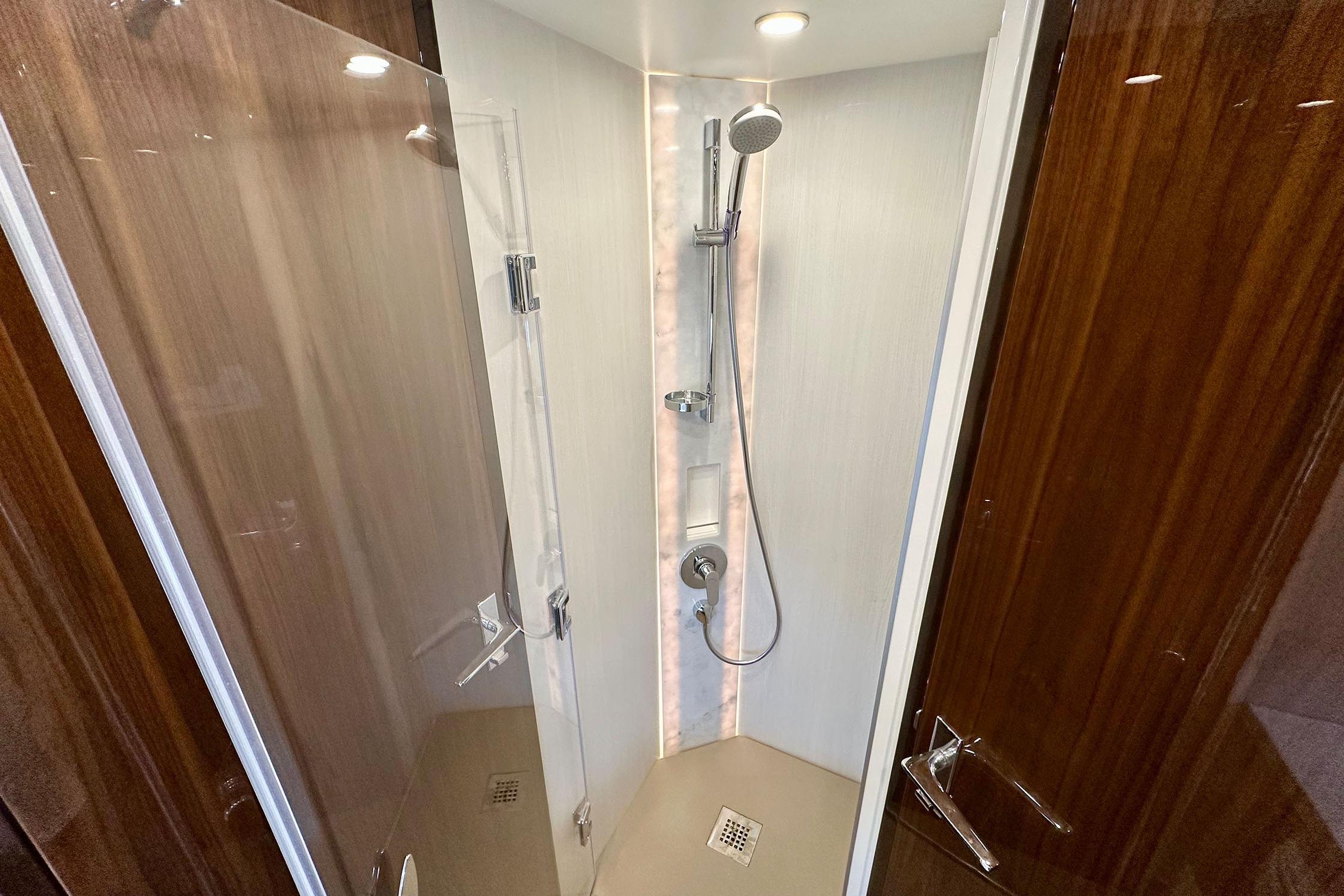 Luxurious shower in 2022 Fairline Targa 50 GT yacht, featuring sleek design and modern fixtures.