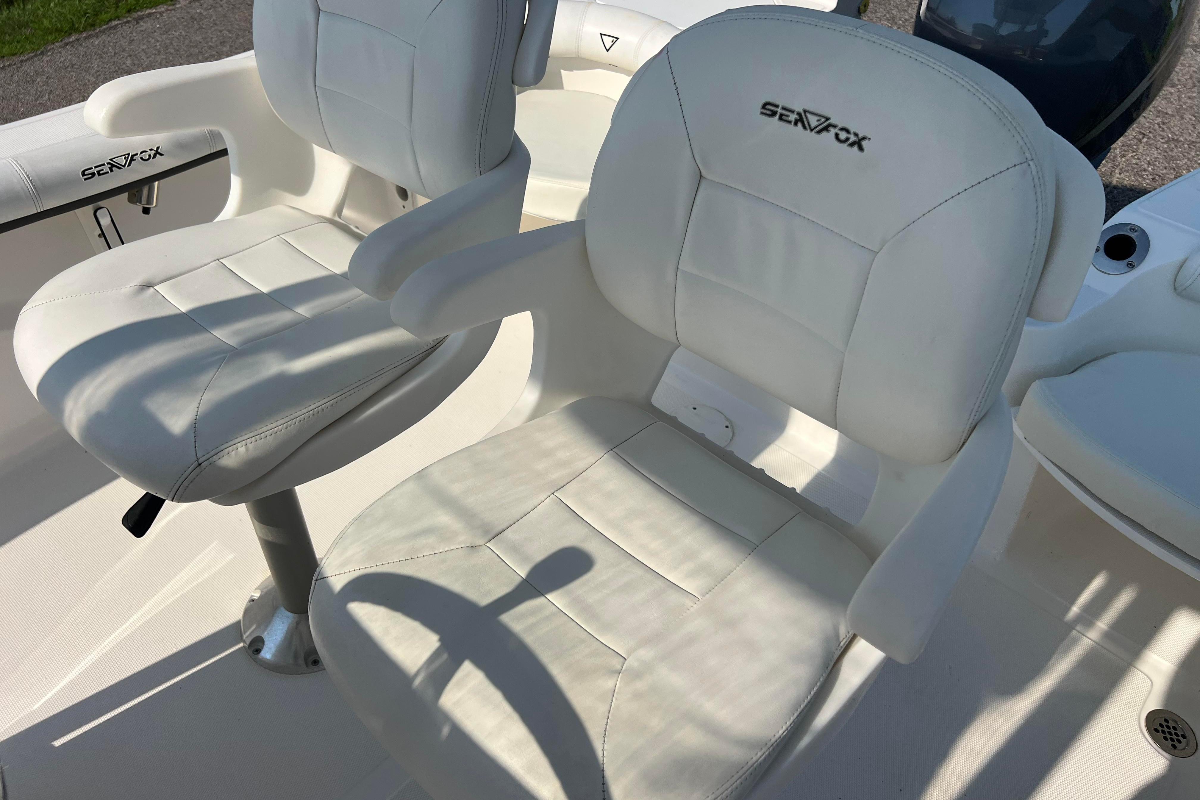 White leather seats on a 2012 Sea Fox 206 Center Console boat.