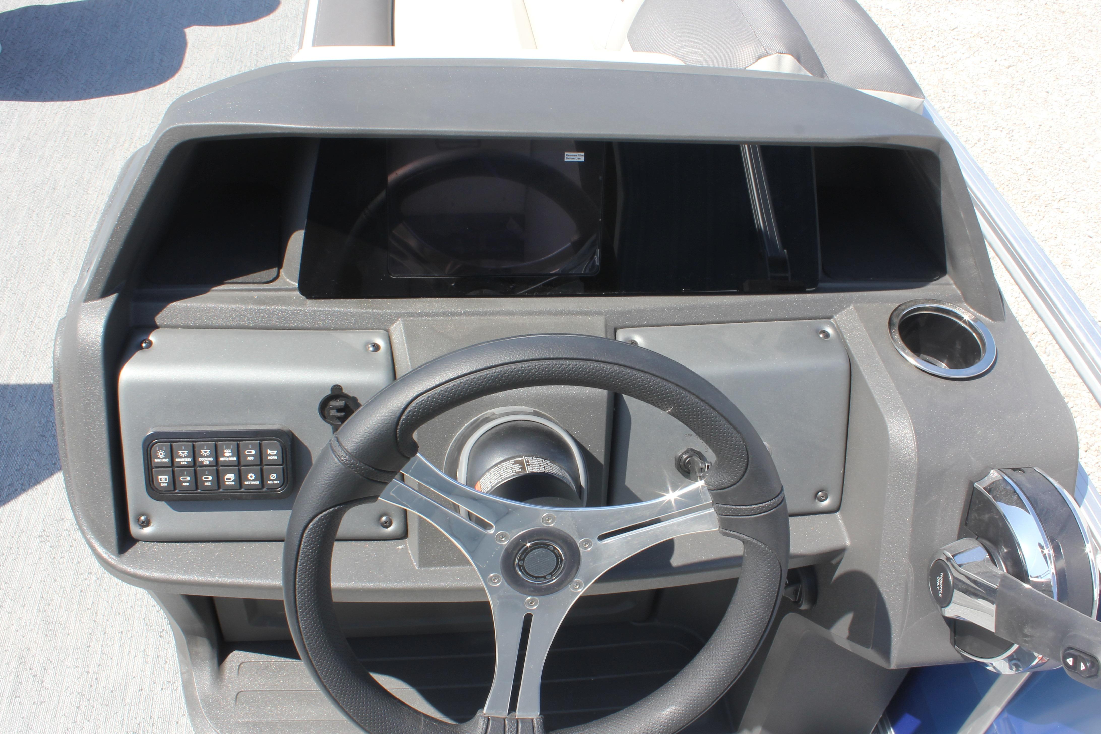 Steering console of 2026 Sun Tracker Fishin' Barge 20 DLX pontoon boat.