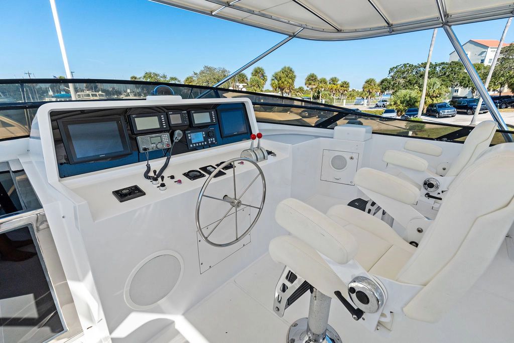 1999 Westport 112 yacht helm with modern navigation equipment.