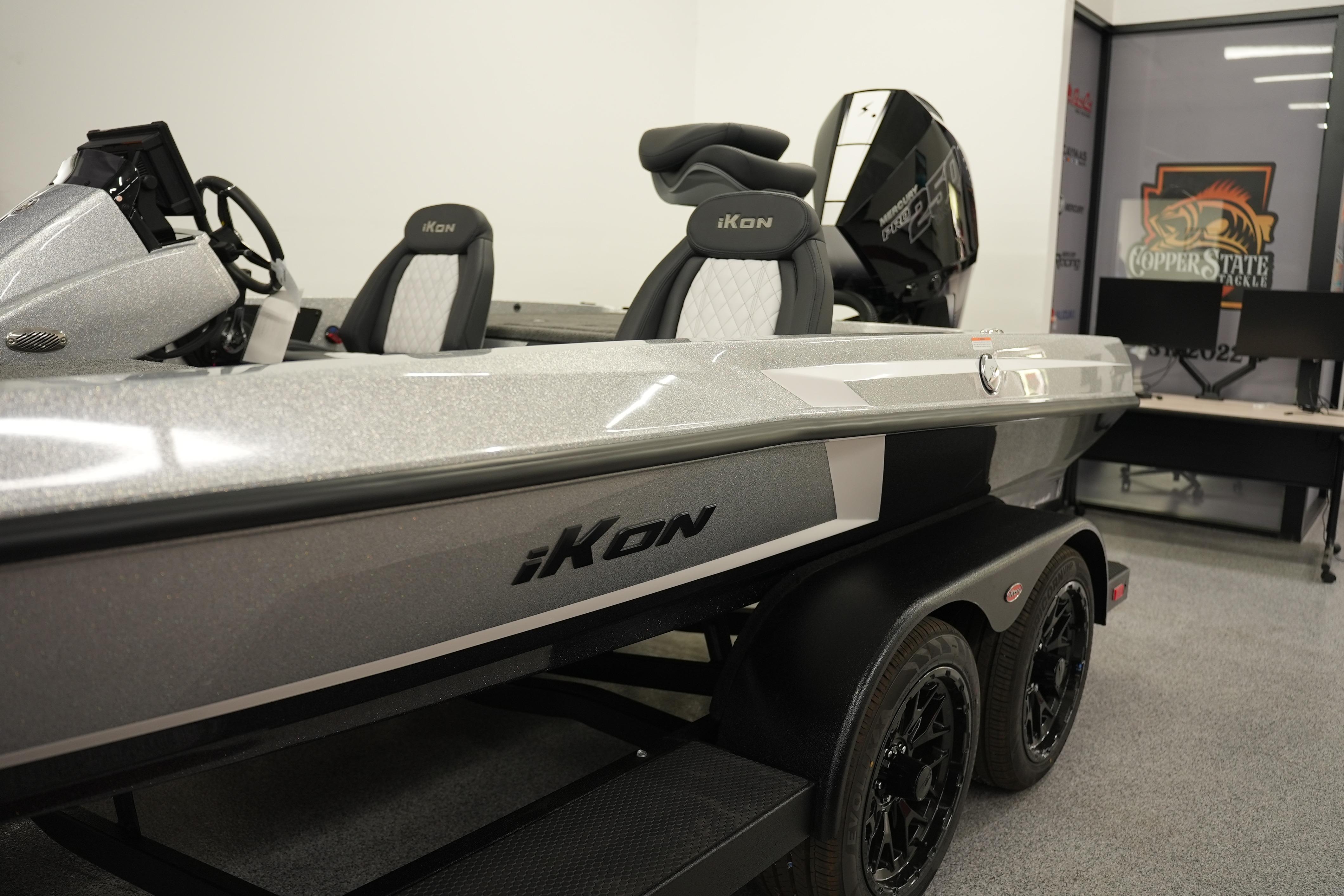 2026 iKon LXE20 boat with sleek design and modern features in showroom setting.