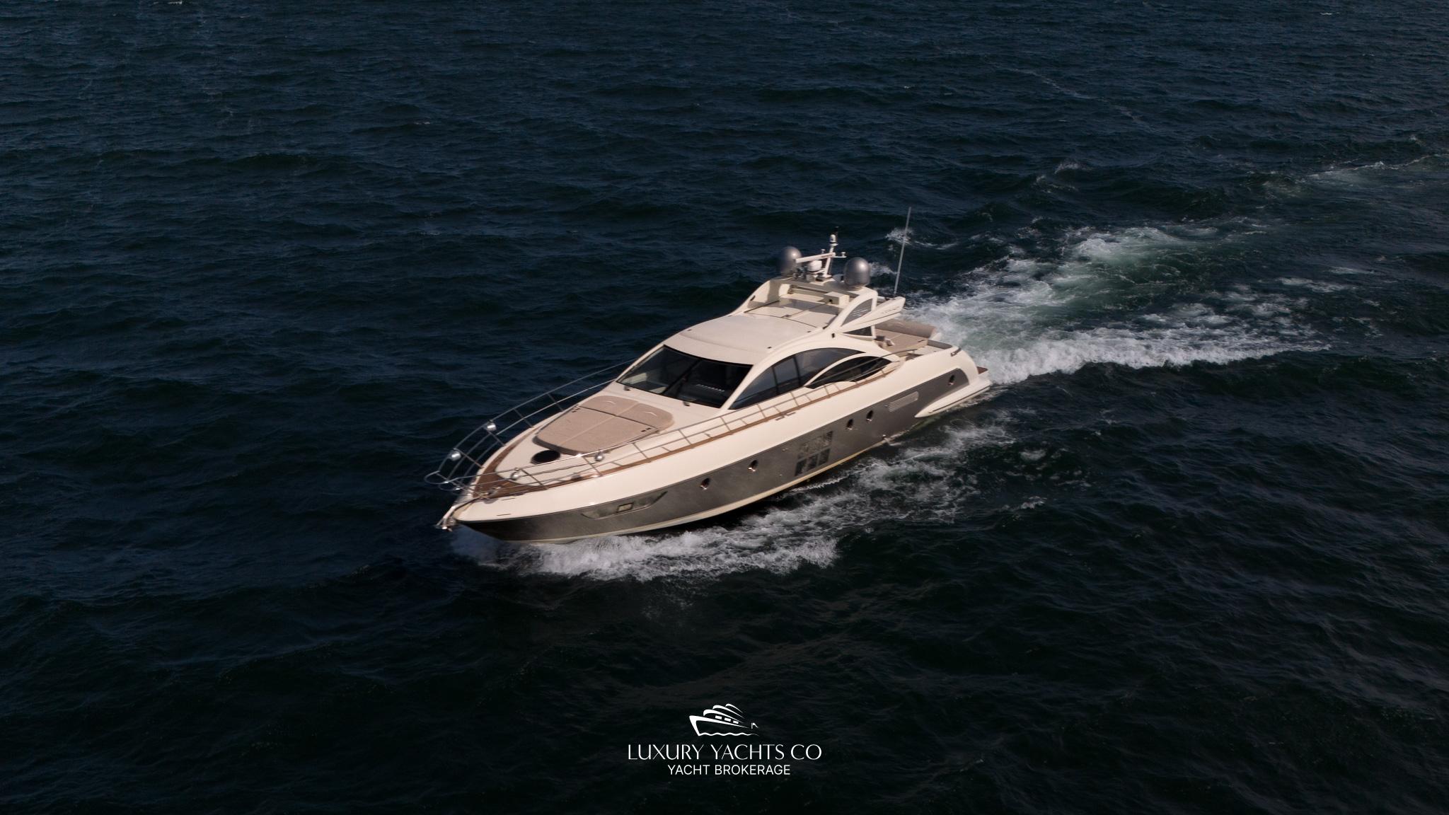Luxury Azimut 62S yacht cruising on open water, 2010 model.