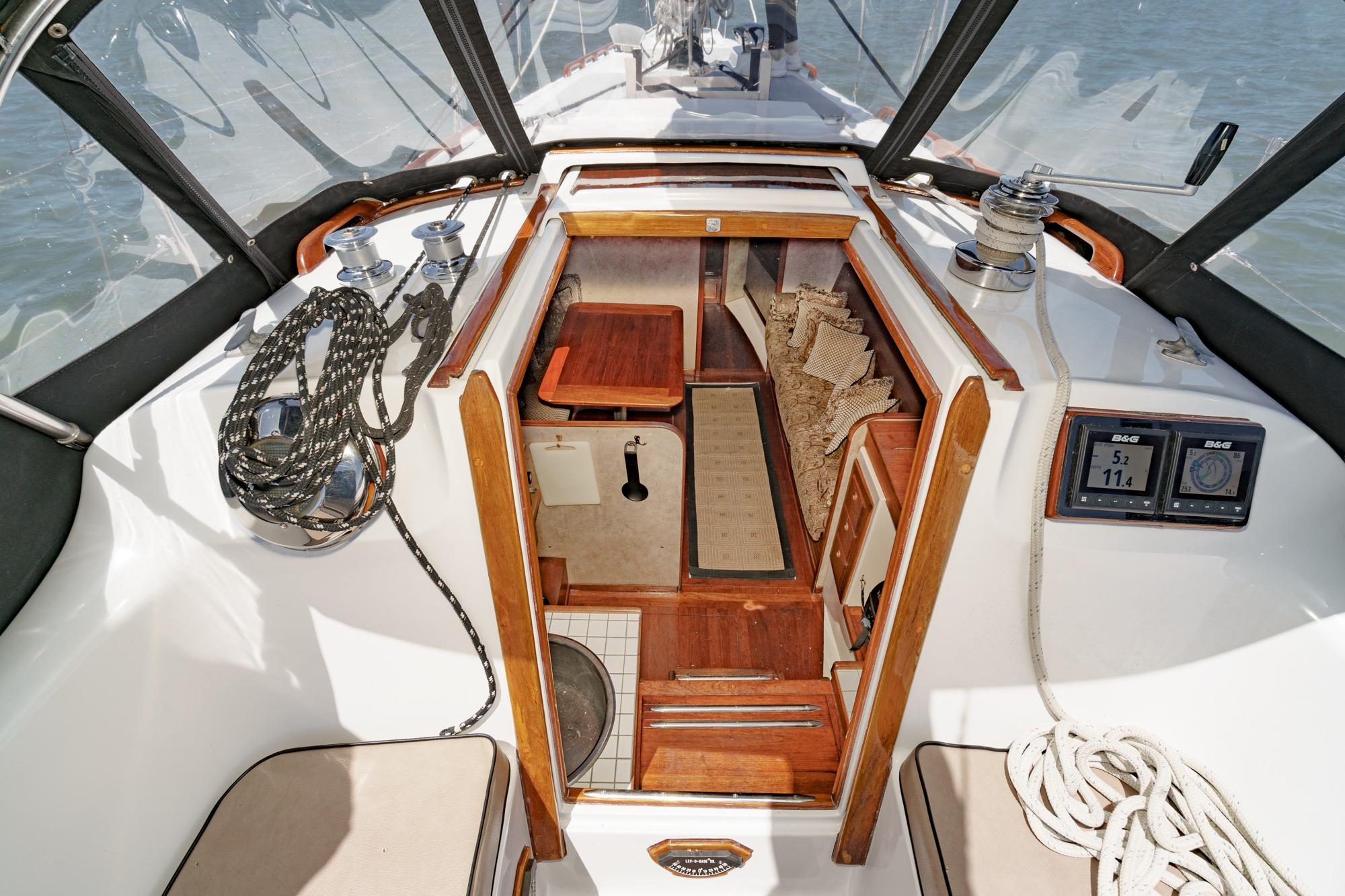 Cockpit view of 1970 Morgan 42 MKI sailboat with ropes and navigation instruments.