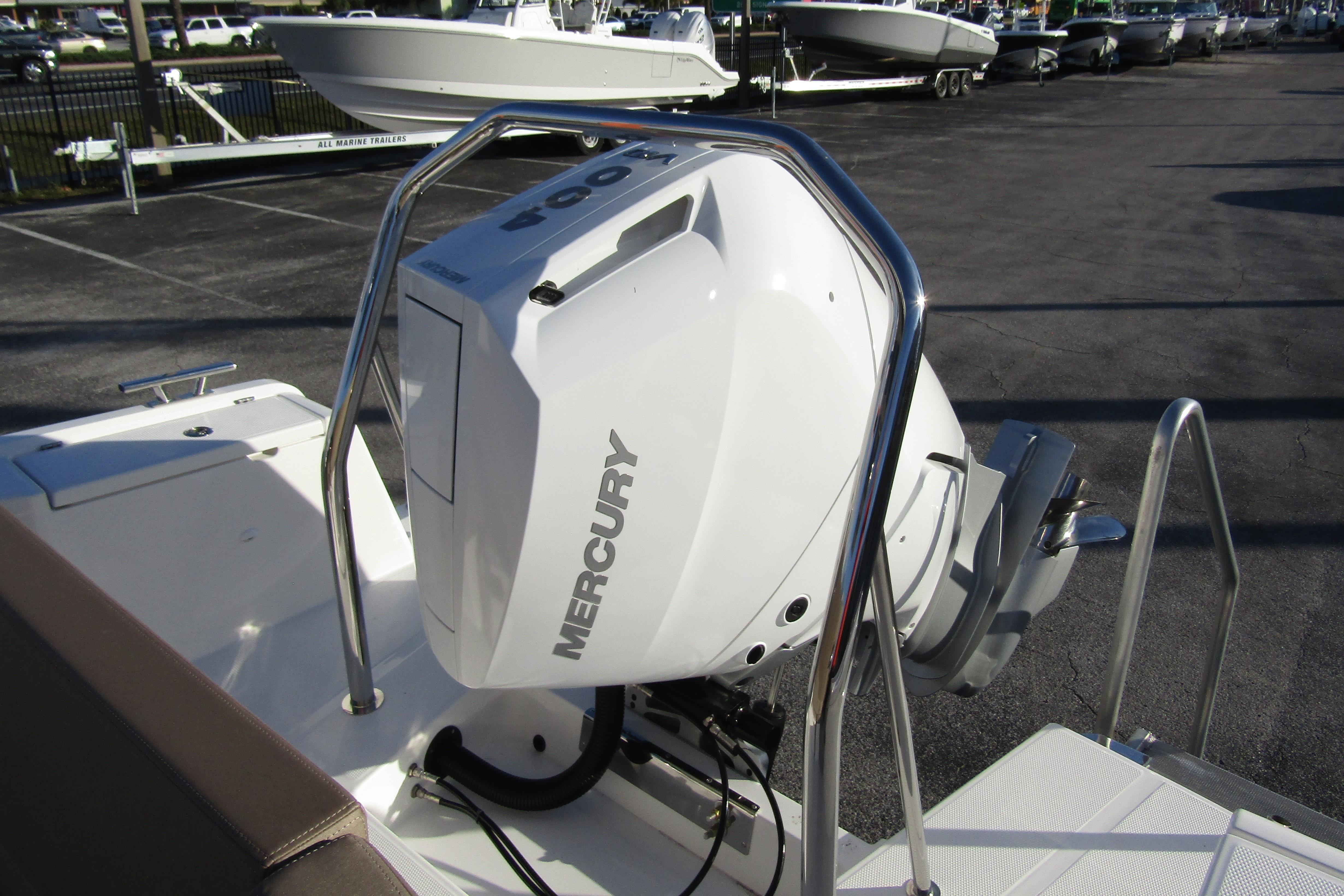 2025 Nimbus Tender 9 with Mercury outboard engine in a boatyard setting.
