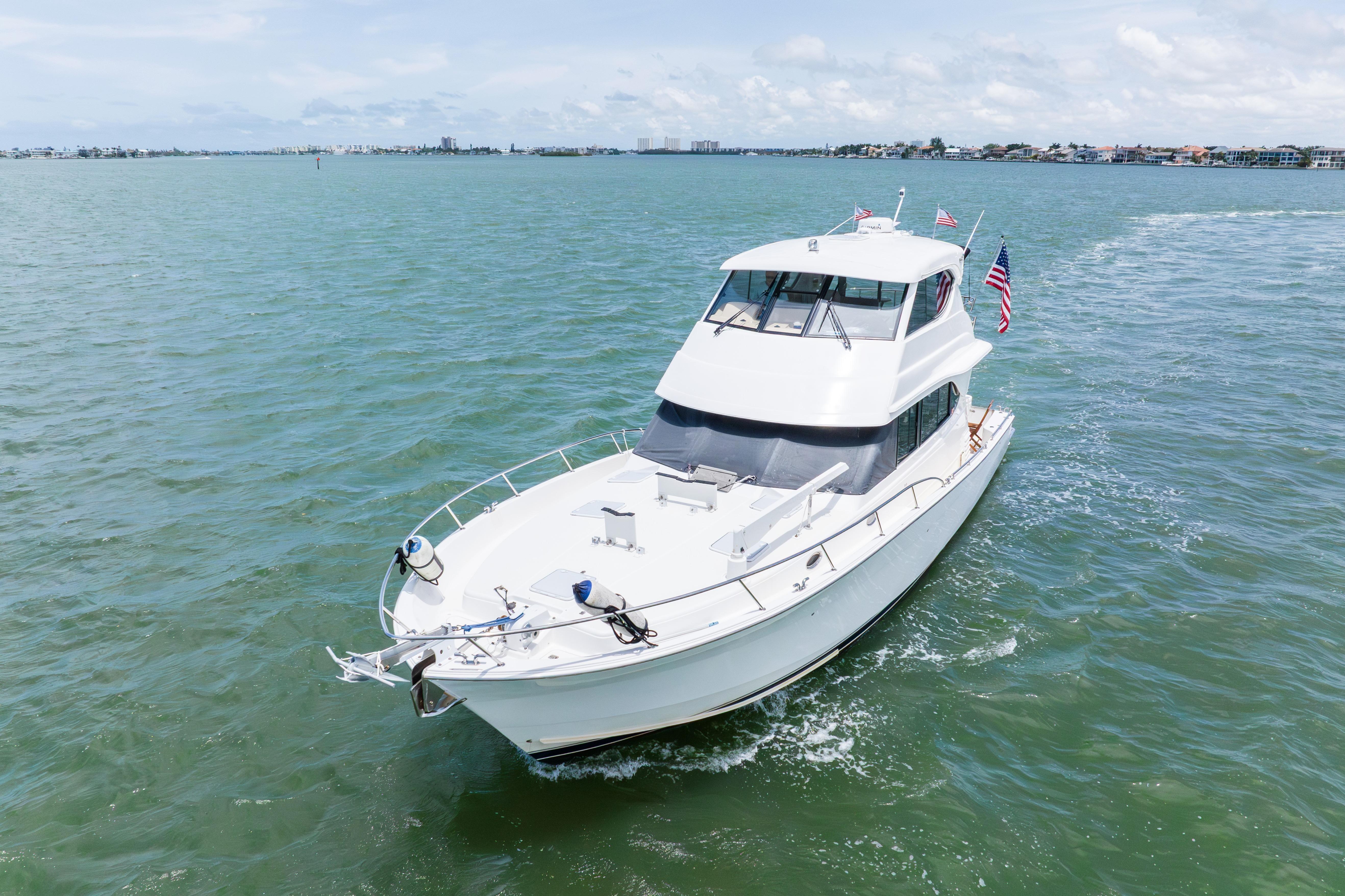 2008 Maritimo 52 yacht cruising on open water under a clear sky.