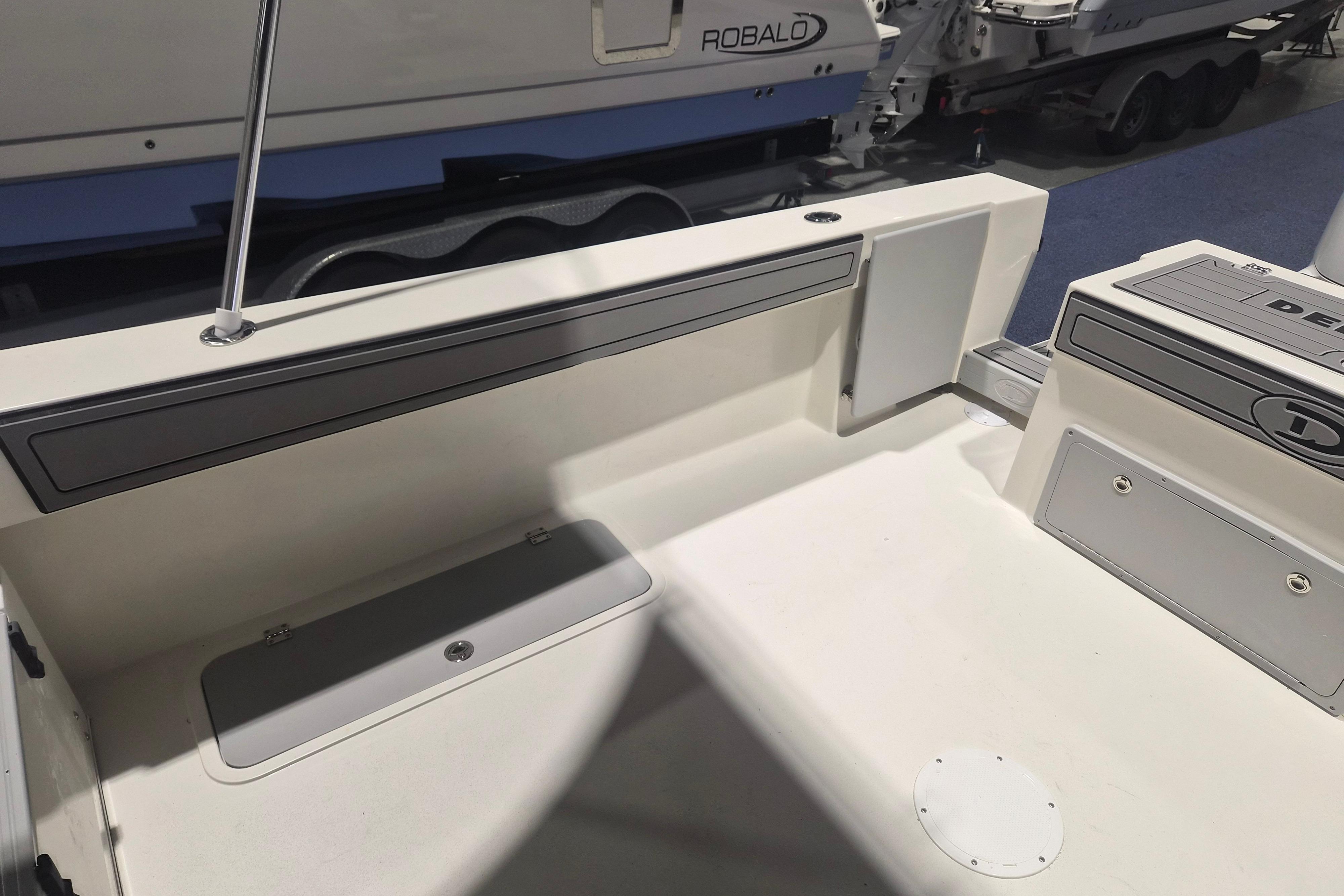 2026 Defiance Admiral 260 EX boat interior, featuring sleek design and storage compartments.