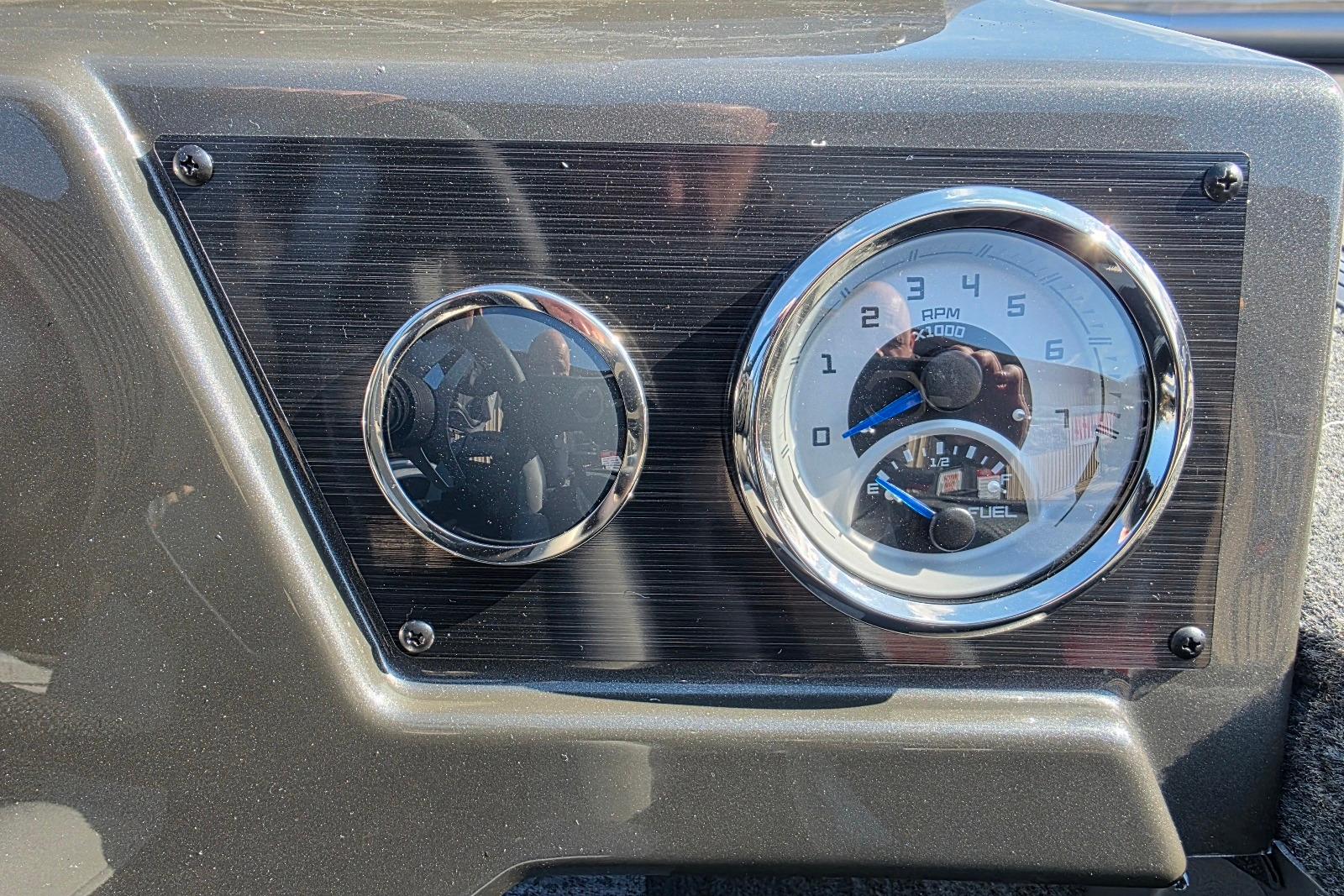 Dashboard of 2026 Smoker Craft Viper 165 with RPM and fuel gauges.
