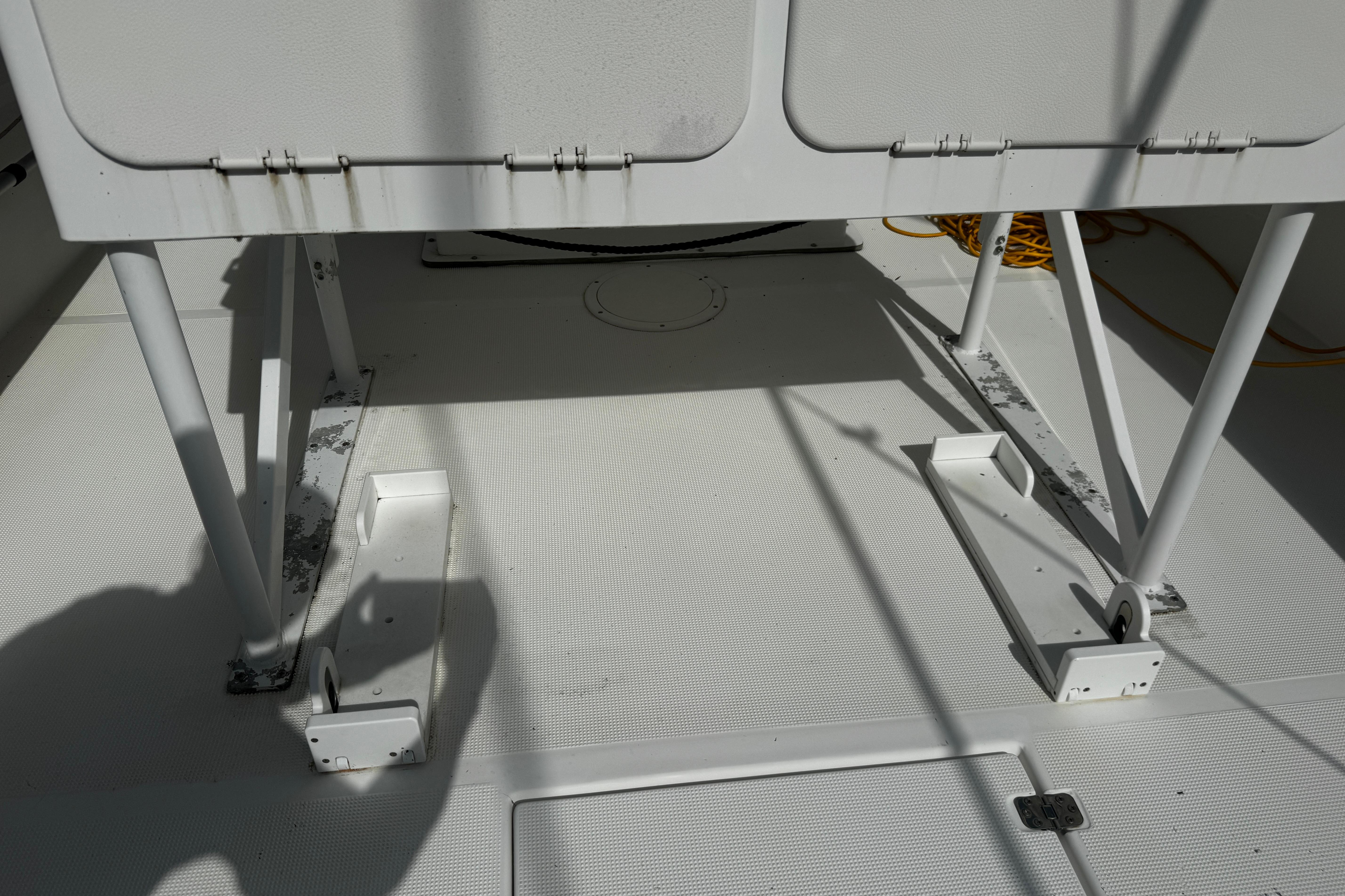 2004 Dusky 33 boat interior showing seating support structure and deck details.
