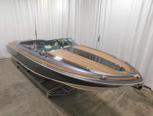 2021 Chris-Craft Corsair 34 boat in a showroom.