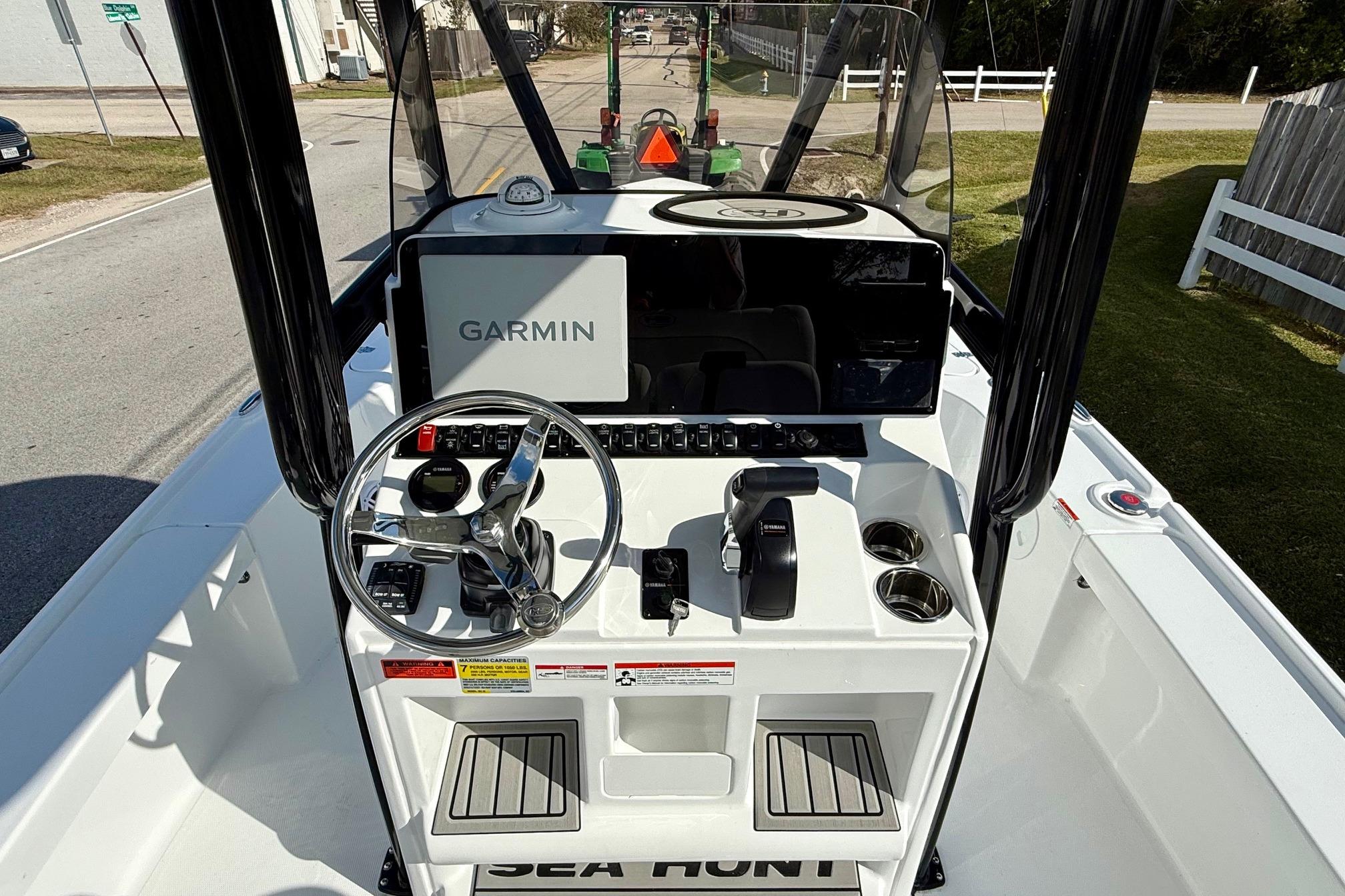 2026 Sea Hunt BX 22 BR boat console with Garmin navigation system and steering wheel.