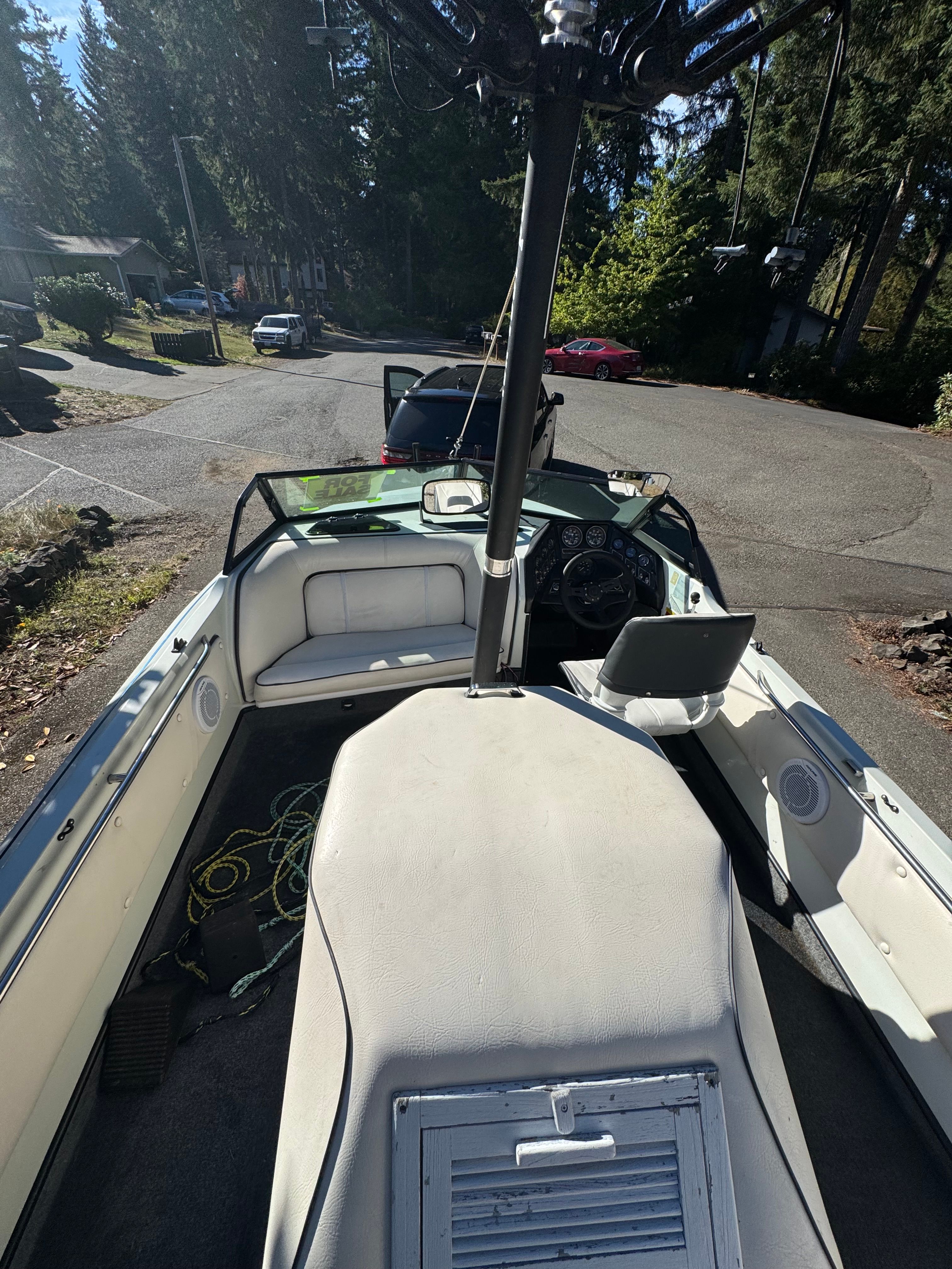 Interior view of a 1990 Supra TS6M boat on a trailer.