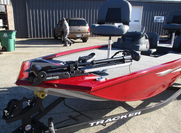 2025 Tracker Pro 170 boat with Minn Kota trolling motor, parked outdoors.