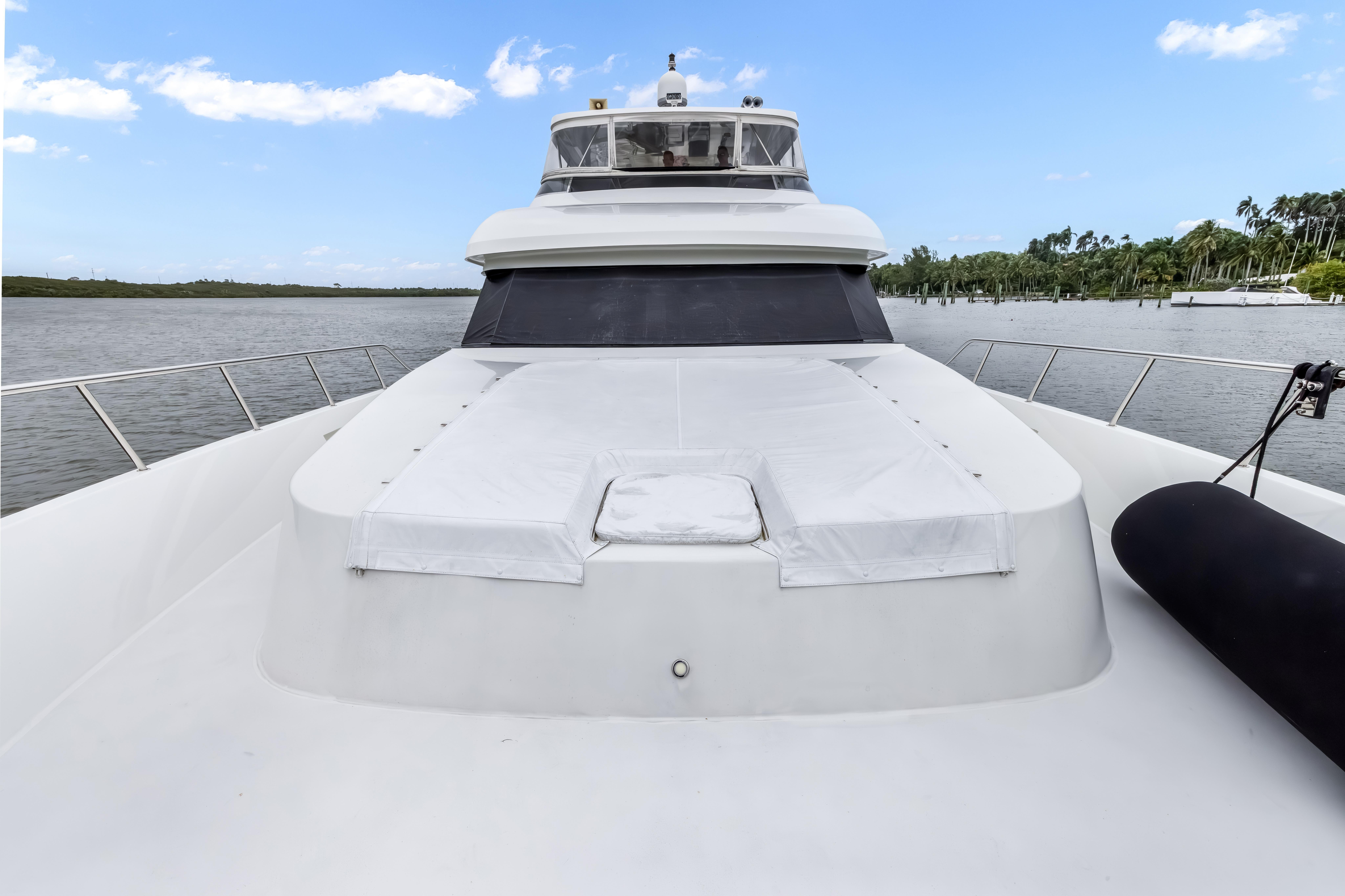 2012 Cheoy Lee 84 Bravo yacht deck with scenic water view.
