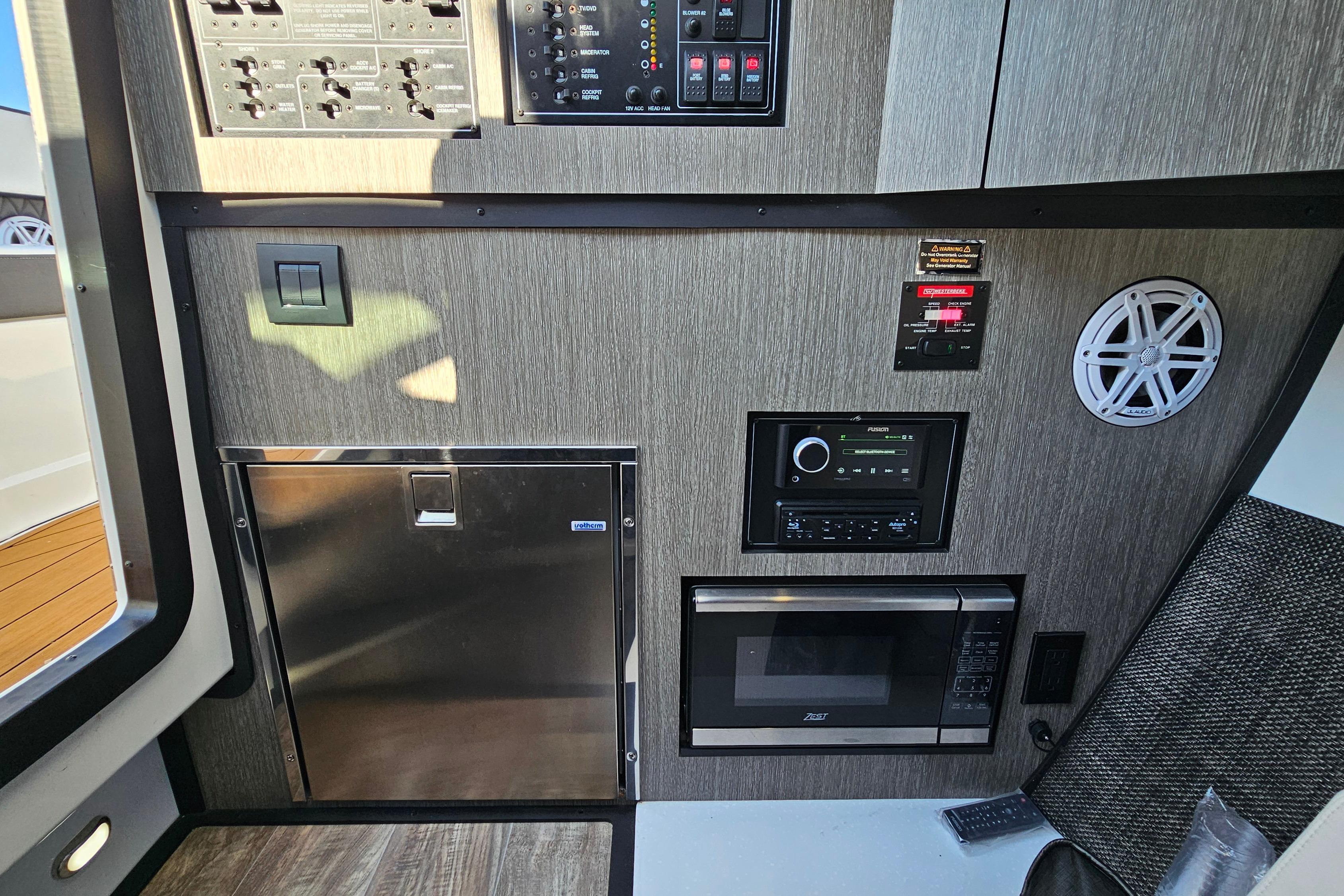 2022 Monterey 378SS Super Sport interior with control panel, microwave, and speaker.