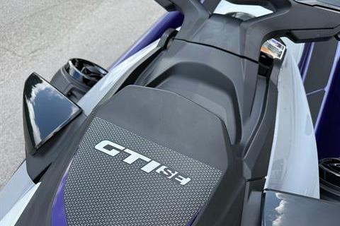 2025 Sea-Doo GTI SE 130 jet ski, top view, sleek design, black and gray color scheme.
