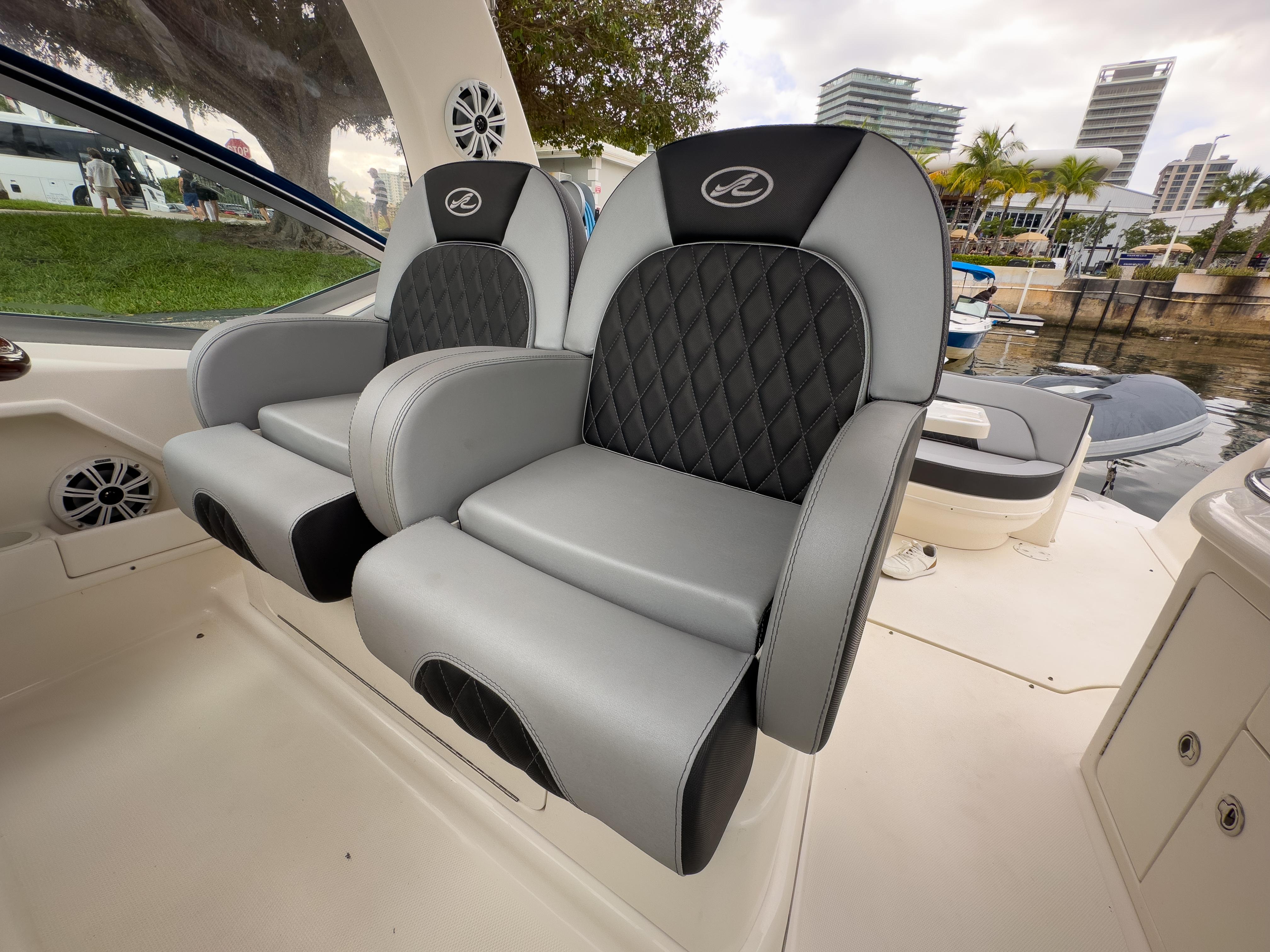 Luxury seating on 2005 Sea Ray 340 Sundancer boat, featuring sleek design and waterfront view.