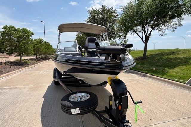 2026 Ranger 212LS boat on trailer, parked outdoors under clear sky.
