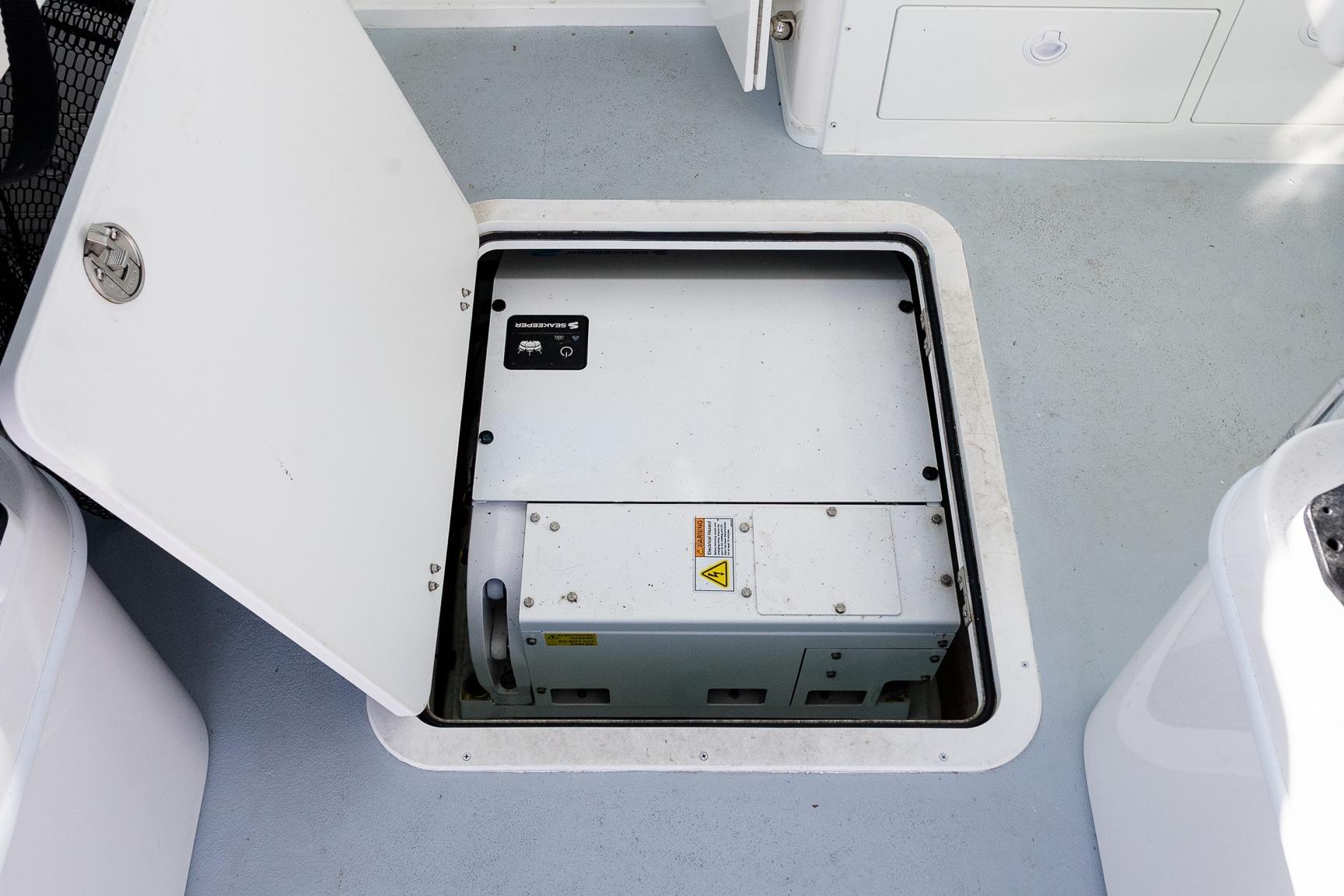 2024 Steiger Craft 31 Fisherman boat compartment with generator.