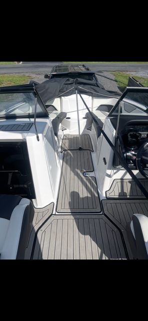 Interior view of a 2021 Yamaha Boats 212S with gray decking.