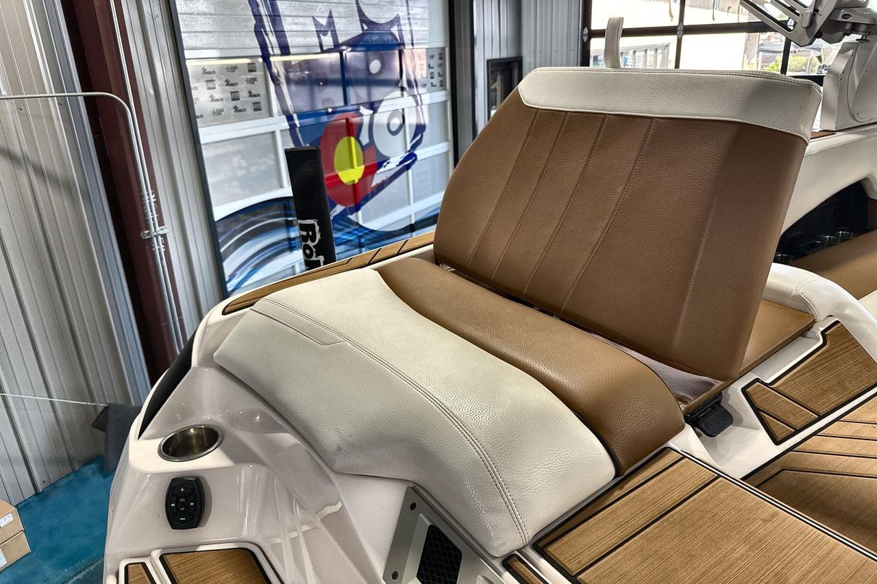2020 Supra SE boat interior with brown and white seating, showcasing luxury design.