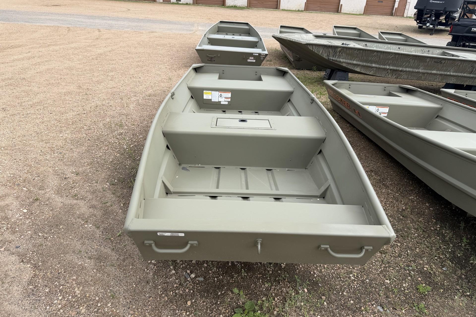 2026 Tracker Grizzly 15 Jon boat displayed on gravel lot.