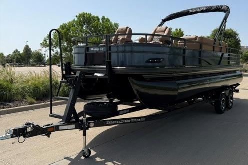 2026 Ranger 223F pontoon boat on trailer, parked outdoors.