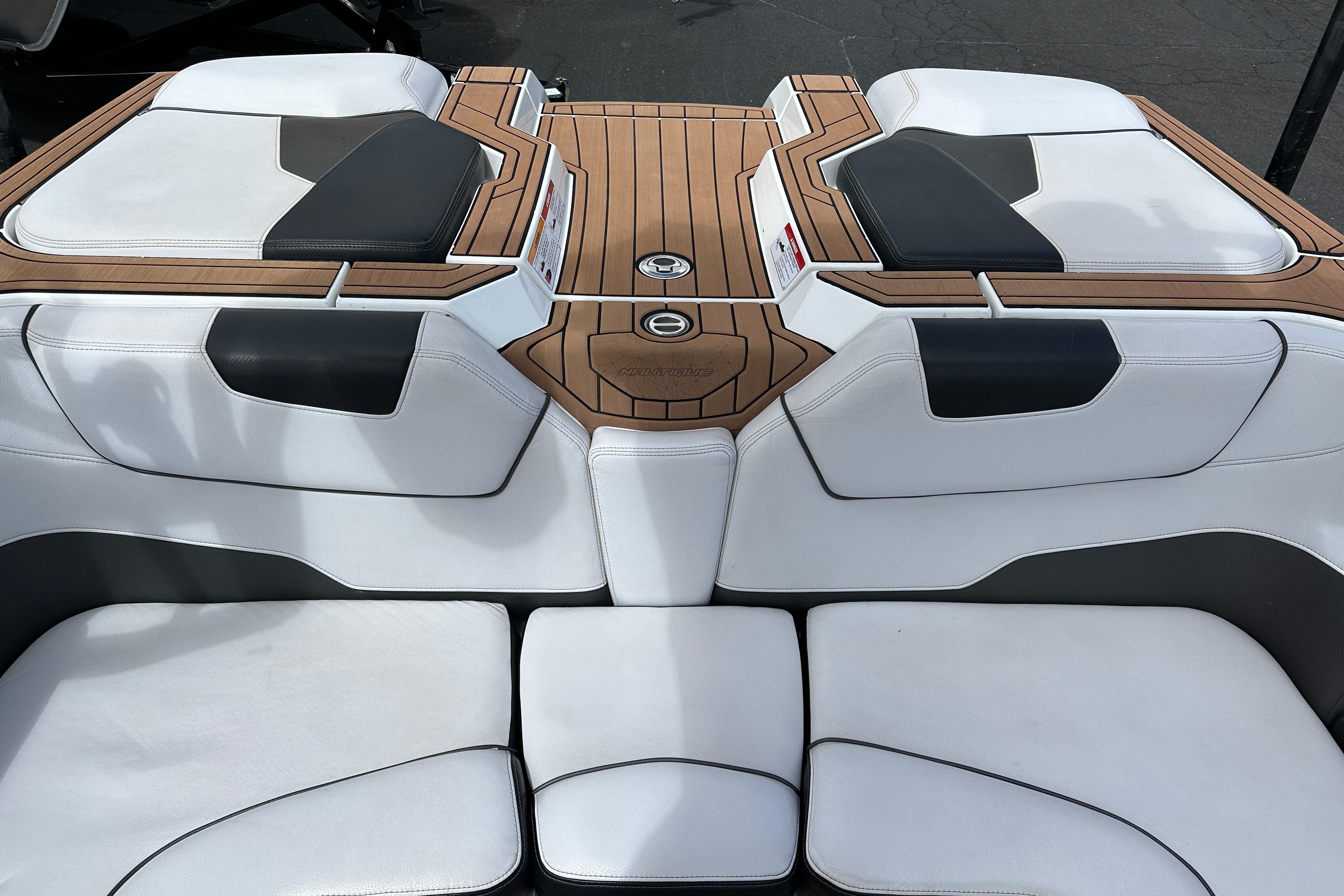 2017 Nautique Super Air Nautique GS20 boat interior with white and black seating.